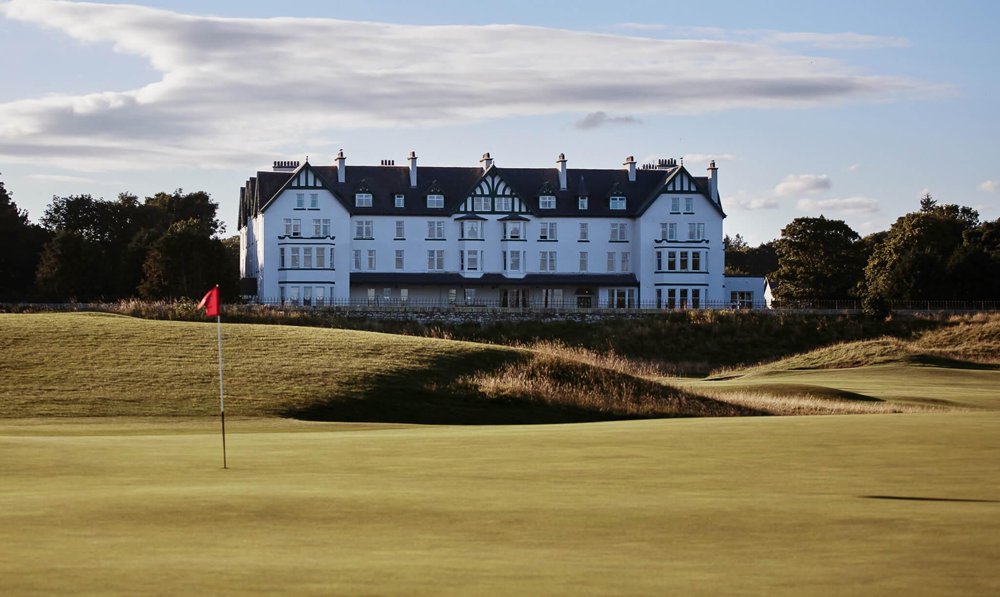 Exterior view of the Clubhouse at the hotel looking over the greens