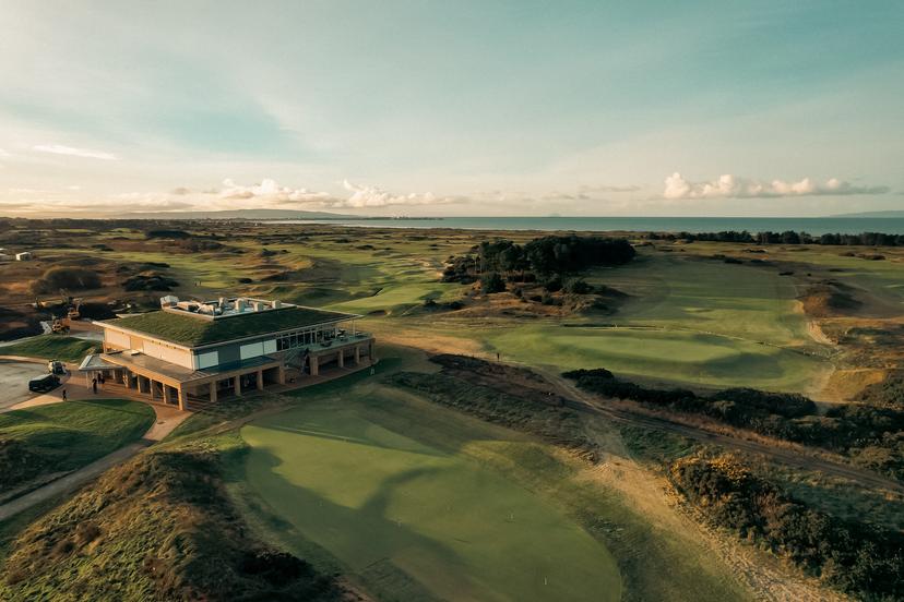 A stunning aerial view of Dundonald Links with the modern clubhouse at the heart of the course.