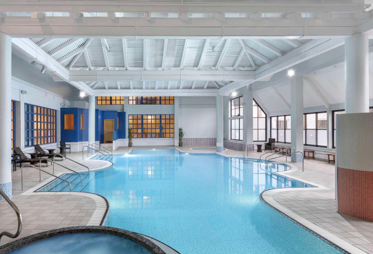 Indoor swimming pool, Jacuzzi and sunbeds part of the spa facilities at the hotel