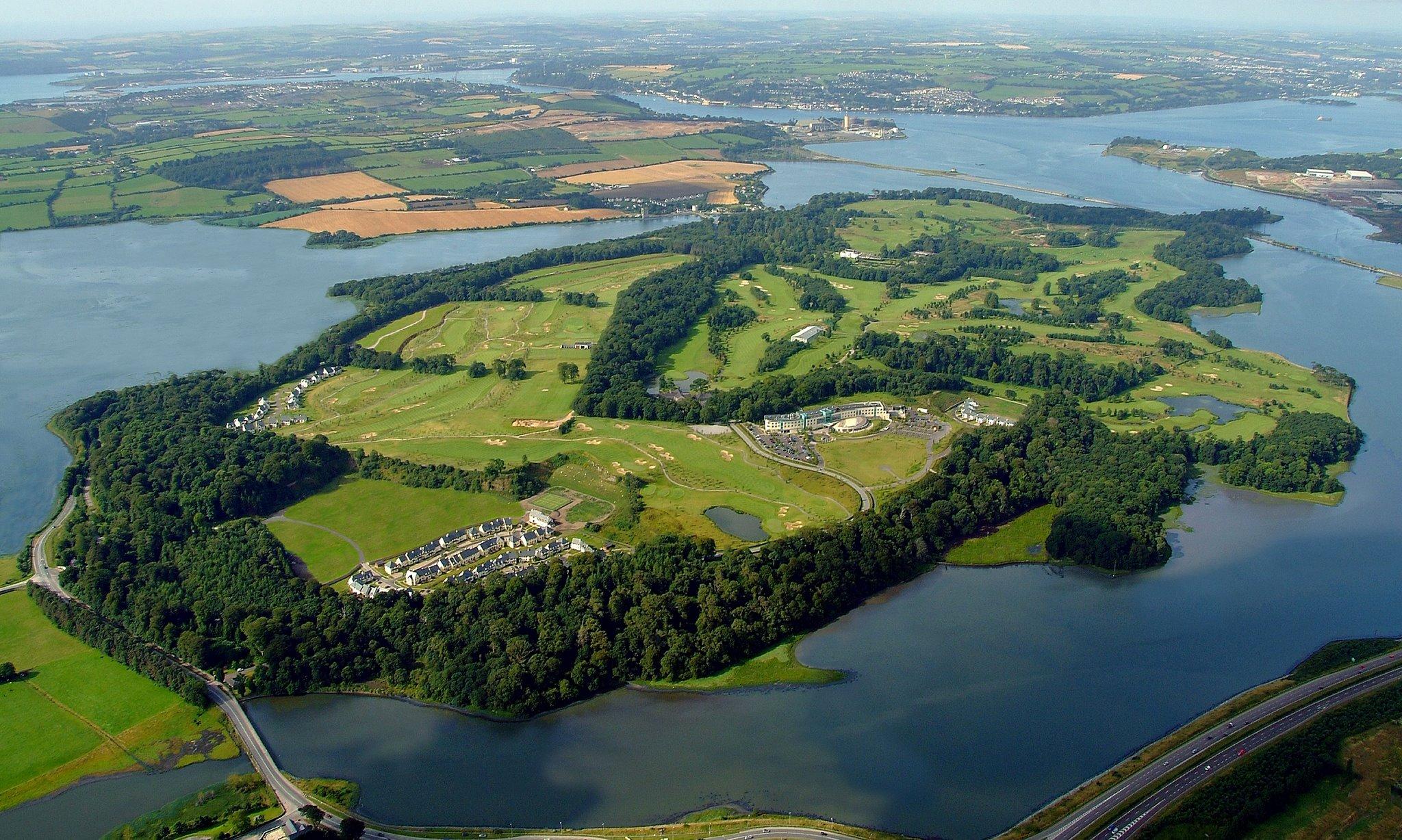 Panoramic aerial shot of entire island and golf course.