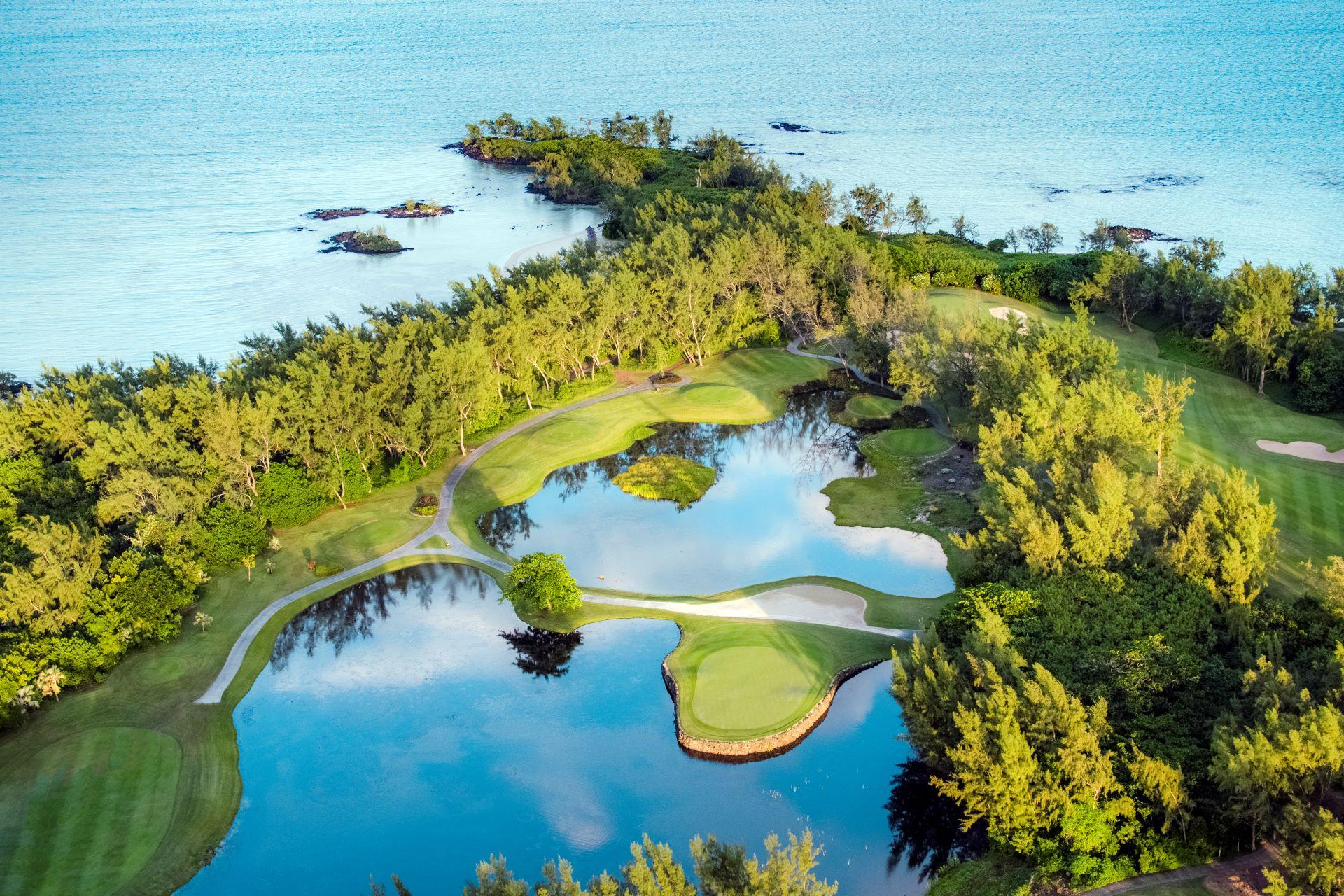 Overhead view of the Heritage Awali Golf & Spa Resort with two large water hazards