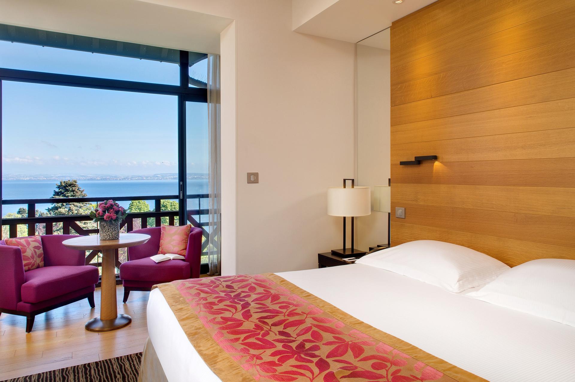 Double bed in a room with balcony