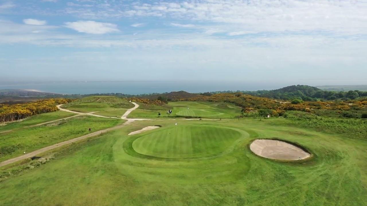 Aerial view of the Isle of Purbeck Golf Club course with coastal views in the distance