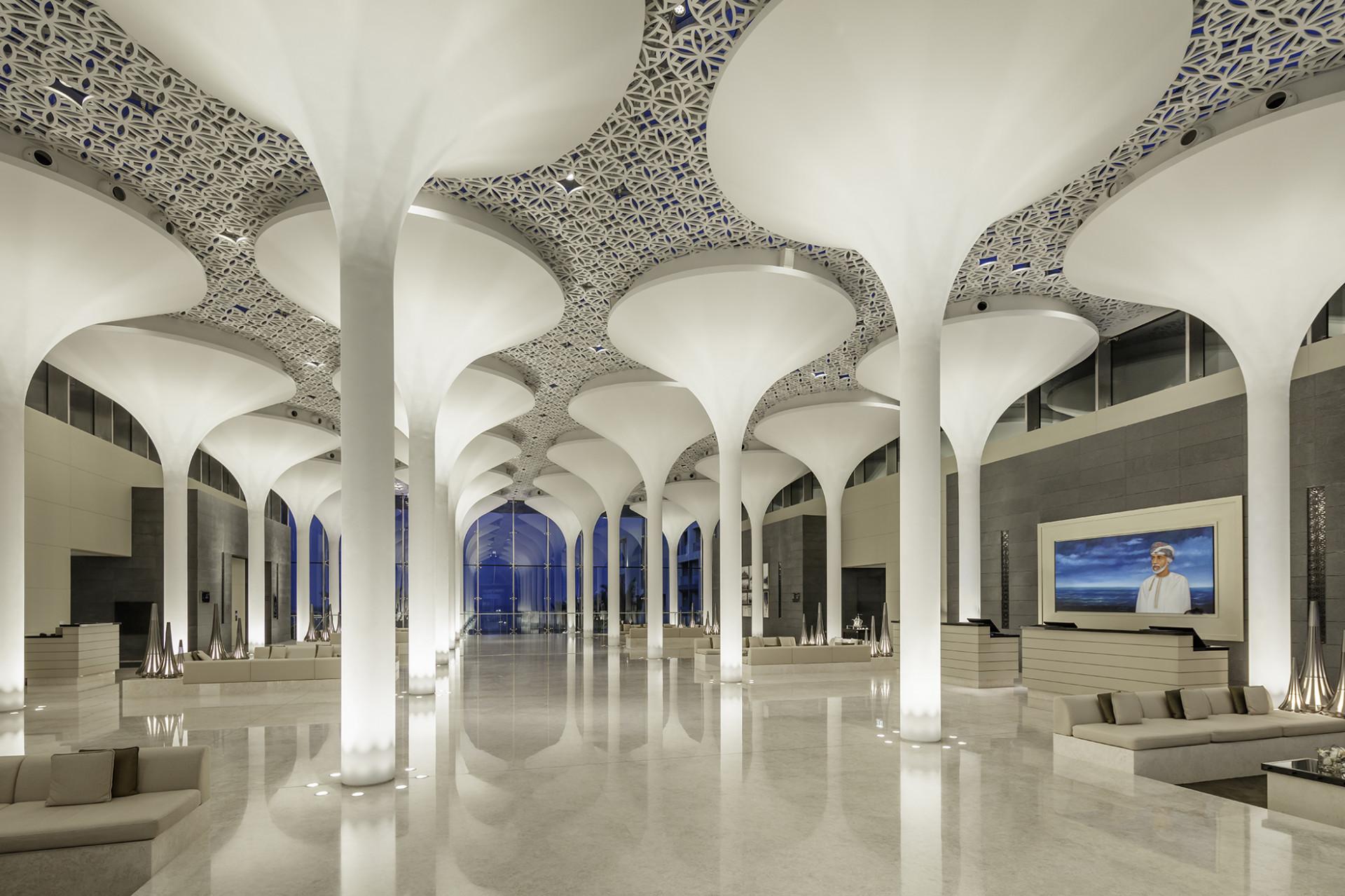 The reception at the Kempinski Hotel Muscat littered with grand pillars