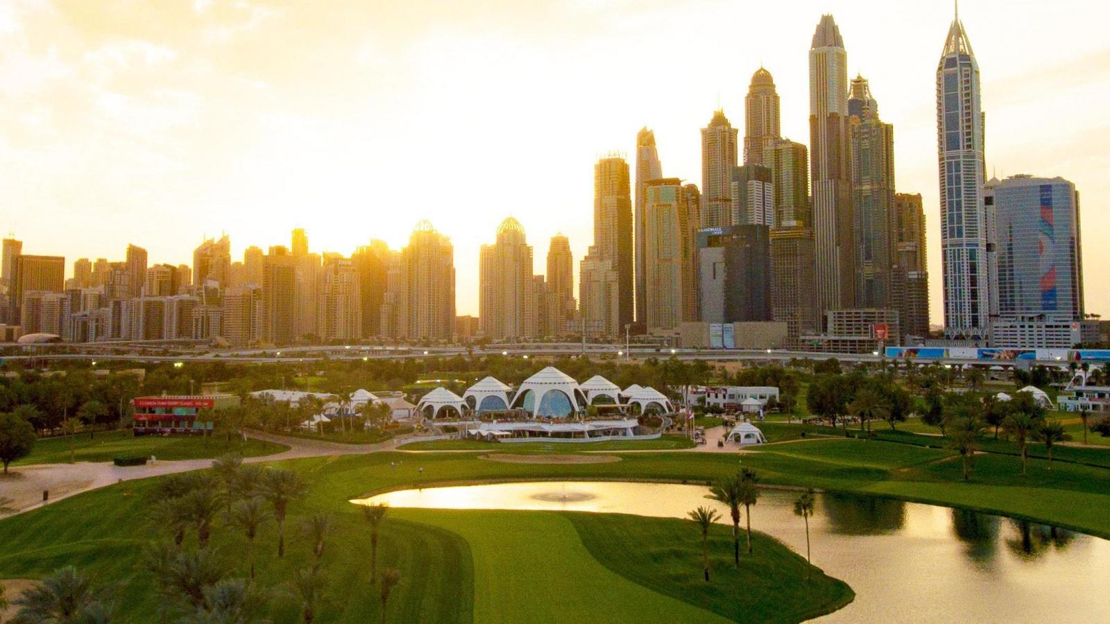 The sun shining through the sky scrapers onto the Majlis Course