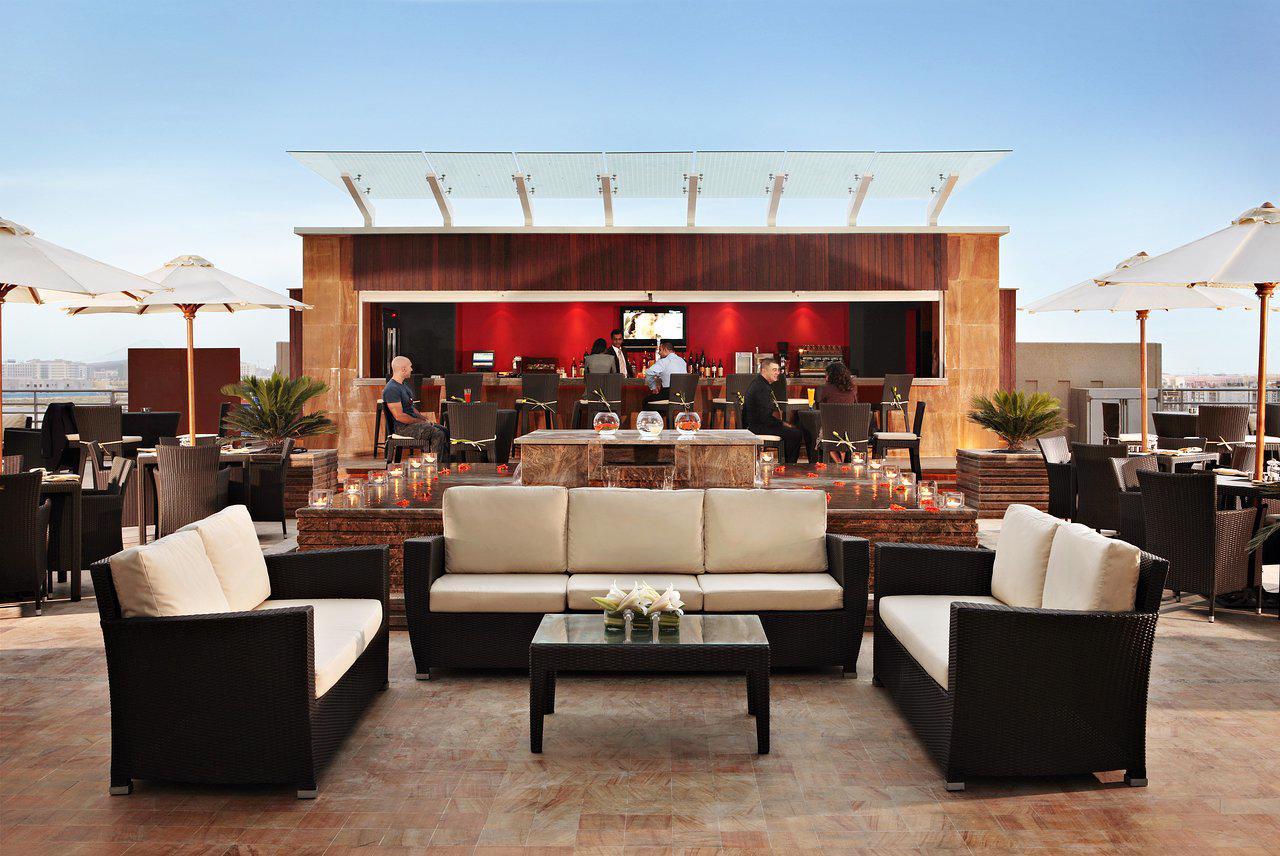 Outdoor bar and seating area with a water fall centre piece