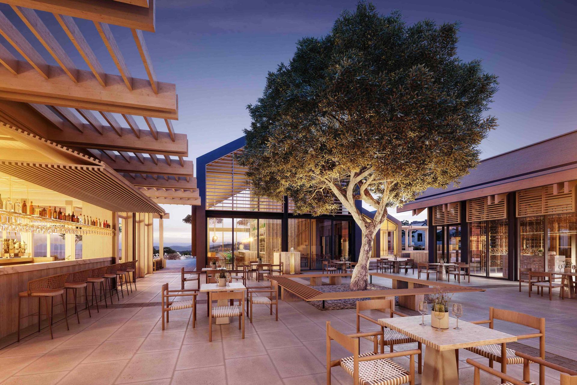 Outdoor bar at the hotel with bar stools and dining tables