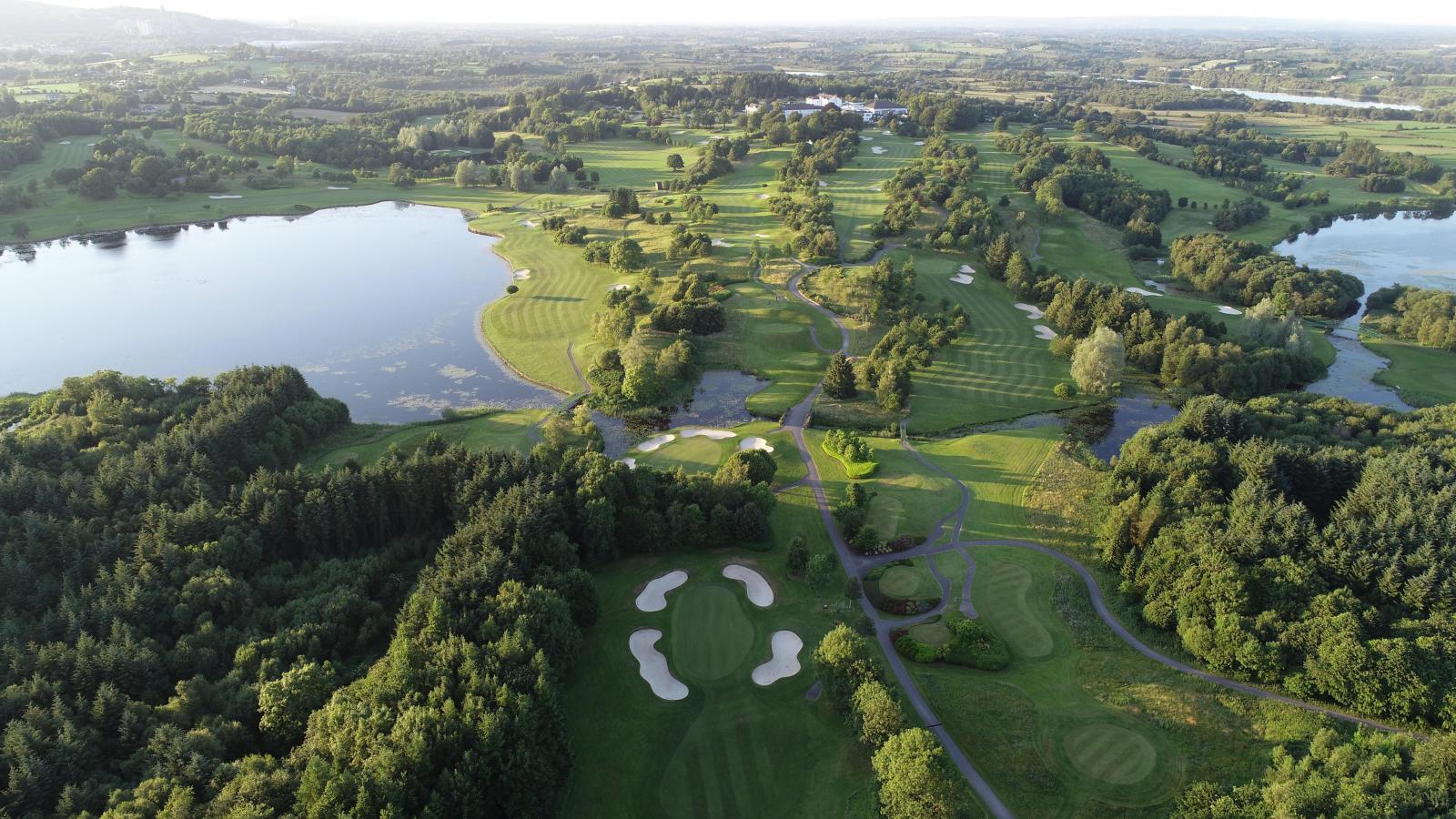 Elevated shot of the PGA National Course showing off its wide fairways, lush greens and eye catching water features.