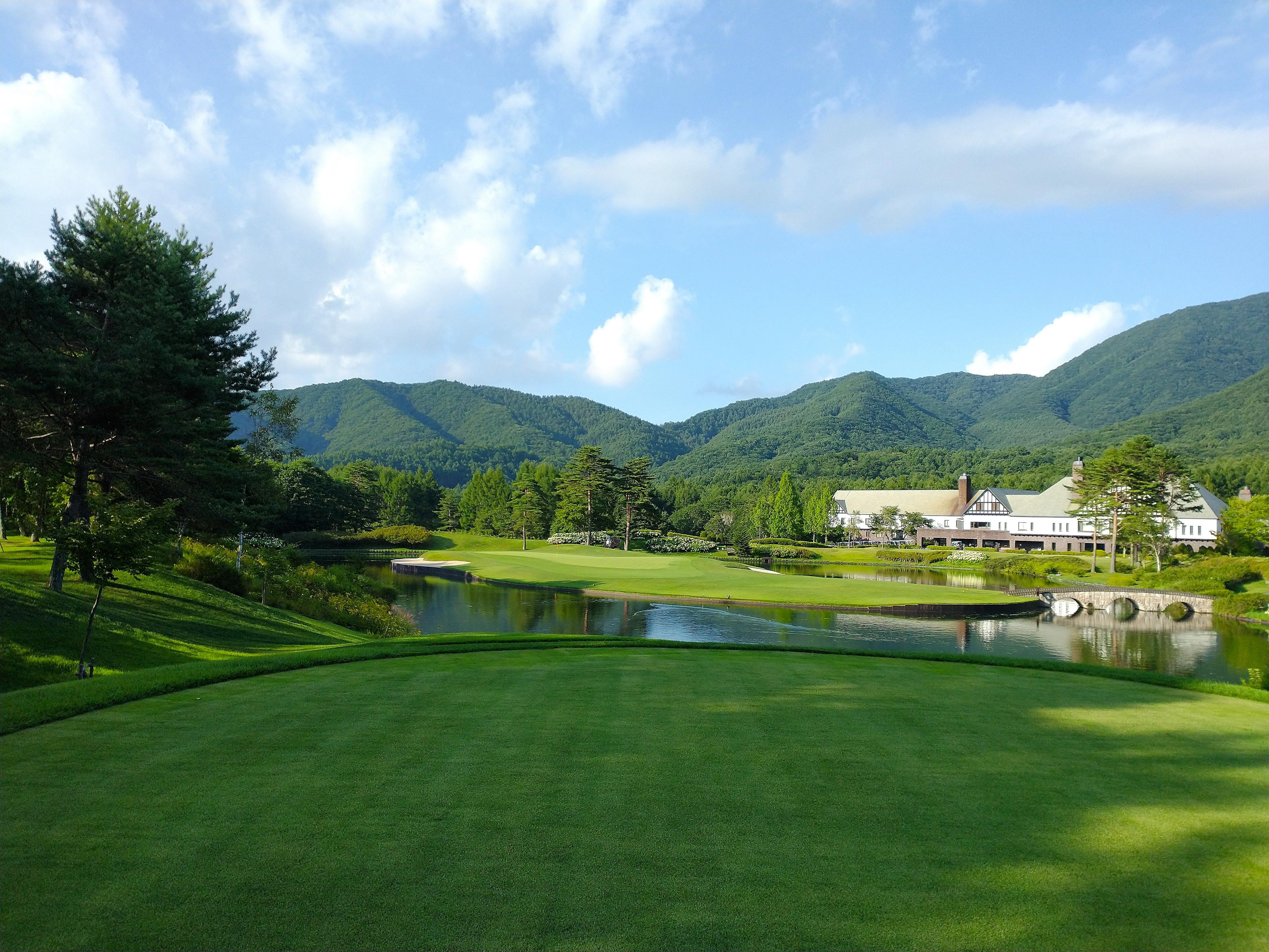 The PGM Golf Resort Okinawa clubhouse overlooking the golf course