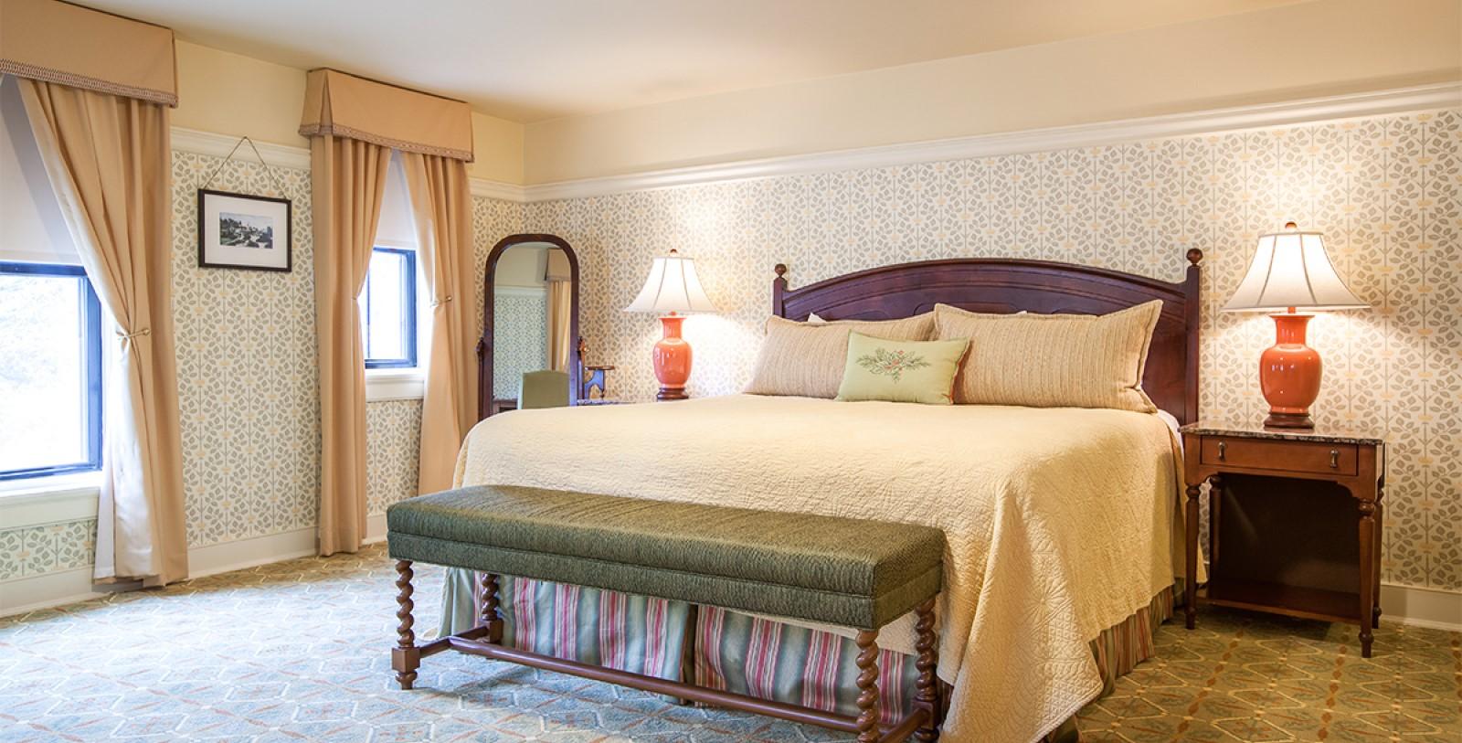 Double bed suite with a homey feel and multiple windows for natural light