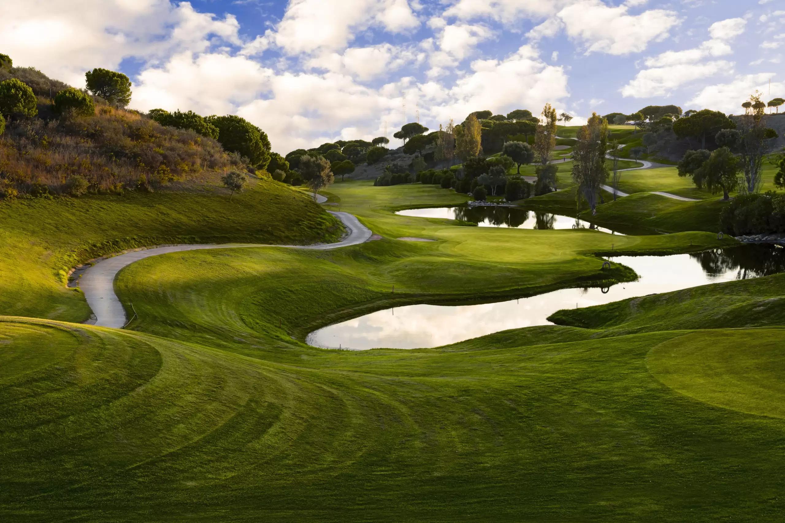 Winding fairway with a green almost entirely surrounded by water