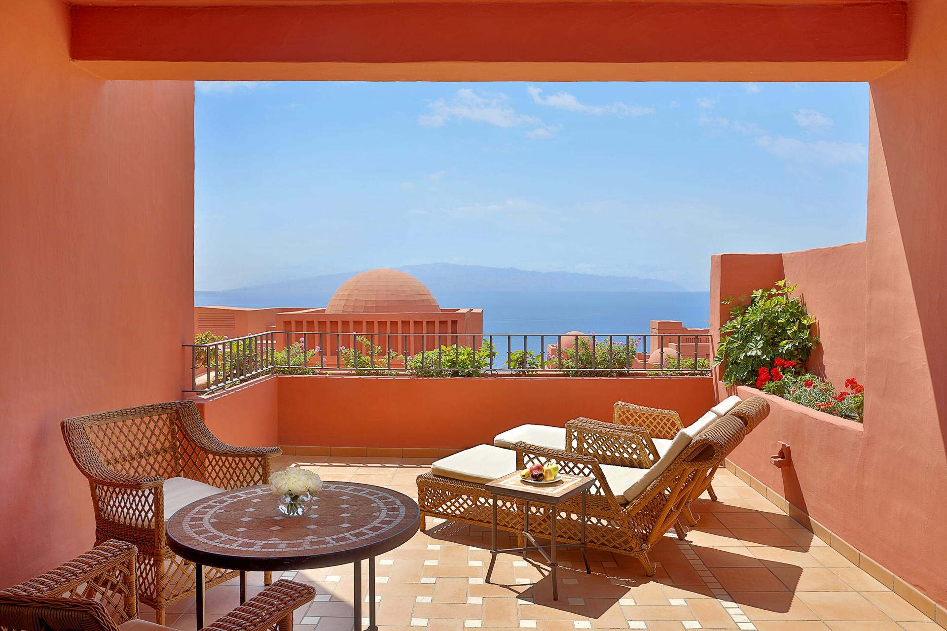 Balcony with sun loungers overlooking the sea