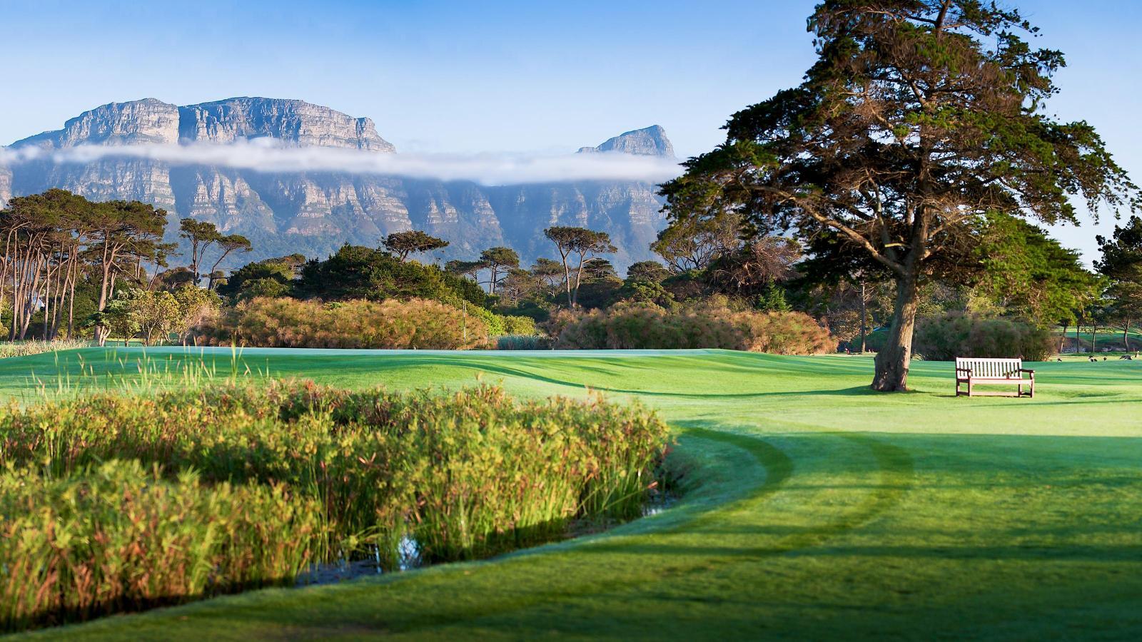 Distant mountains towering over the Royal Cape Golf Club course