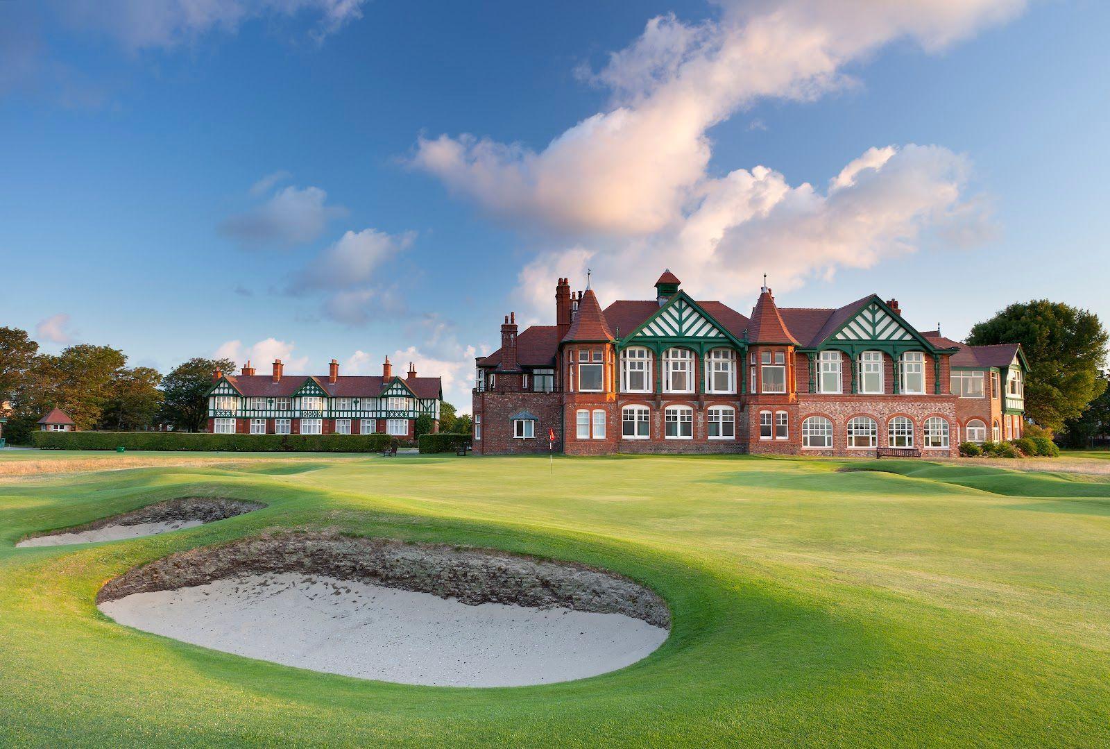 Sand bunkers nestled around the green of the hole placed directly infront of the clubhouse.