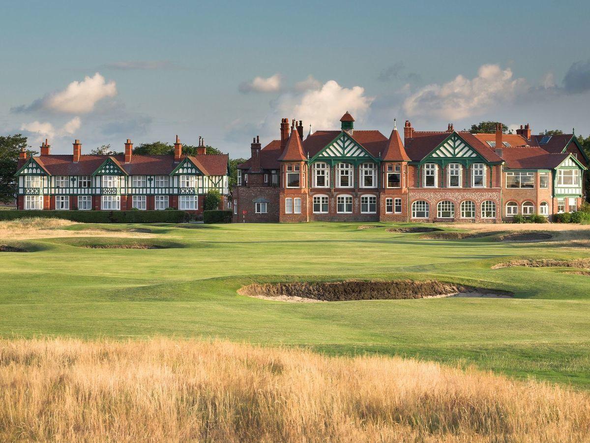 The Royal Lytham clubhouse looking over the course's smooth green with a hole placed right in front of the building