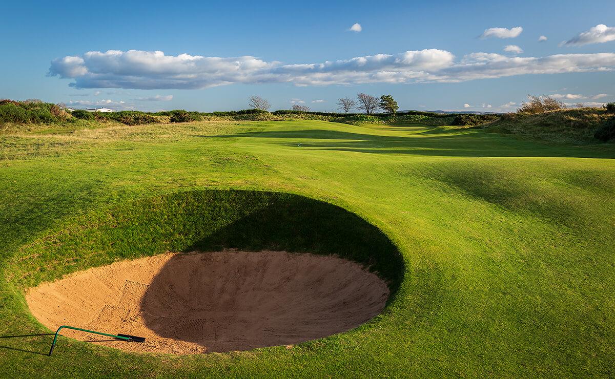 Deep sand bunker strategically placed on the green at the Royal Troon