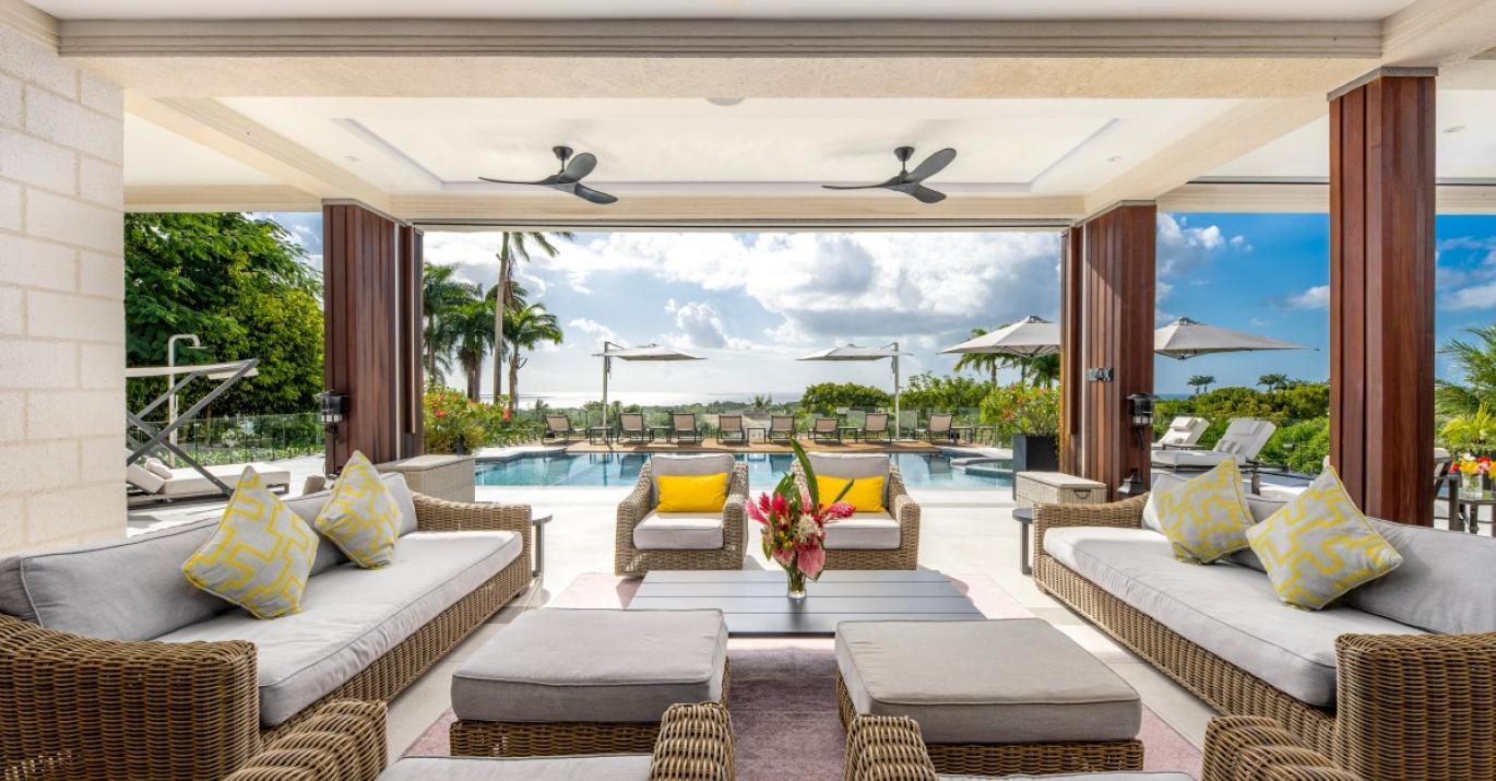 Poolside sofas at the Royal Westmoreland Resort for lounging
