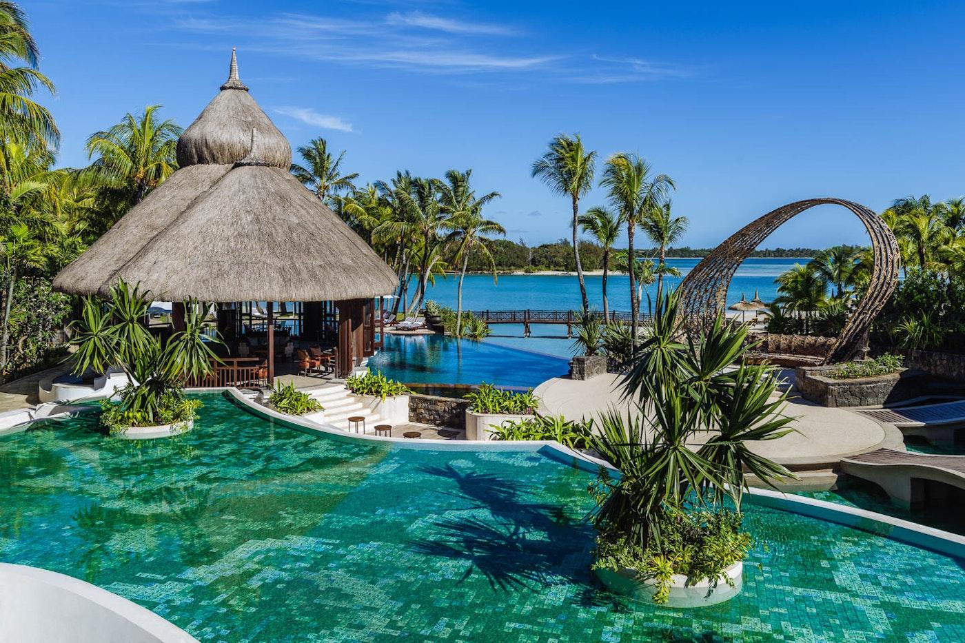 The outdoor swimming pool at Shangri-La Le Touessrok Mauritius with views of the sea