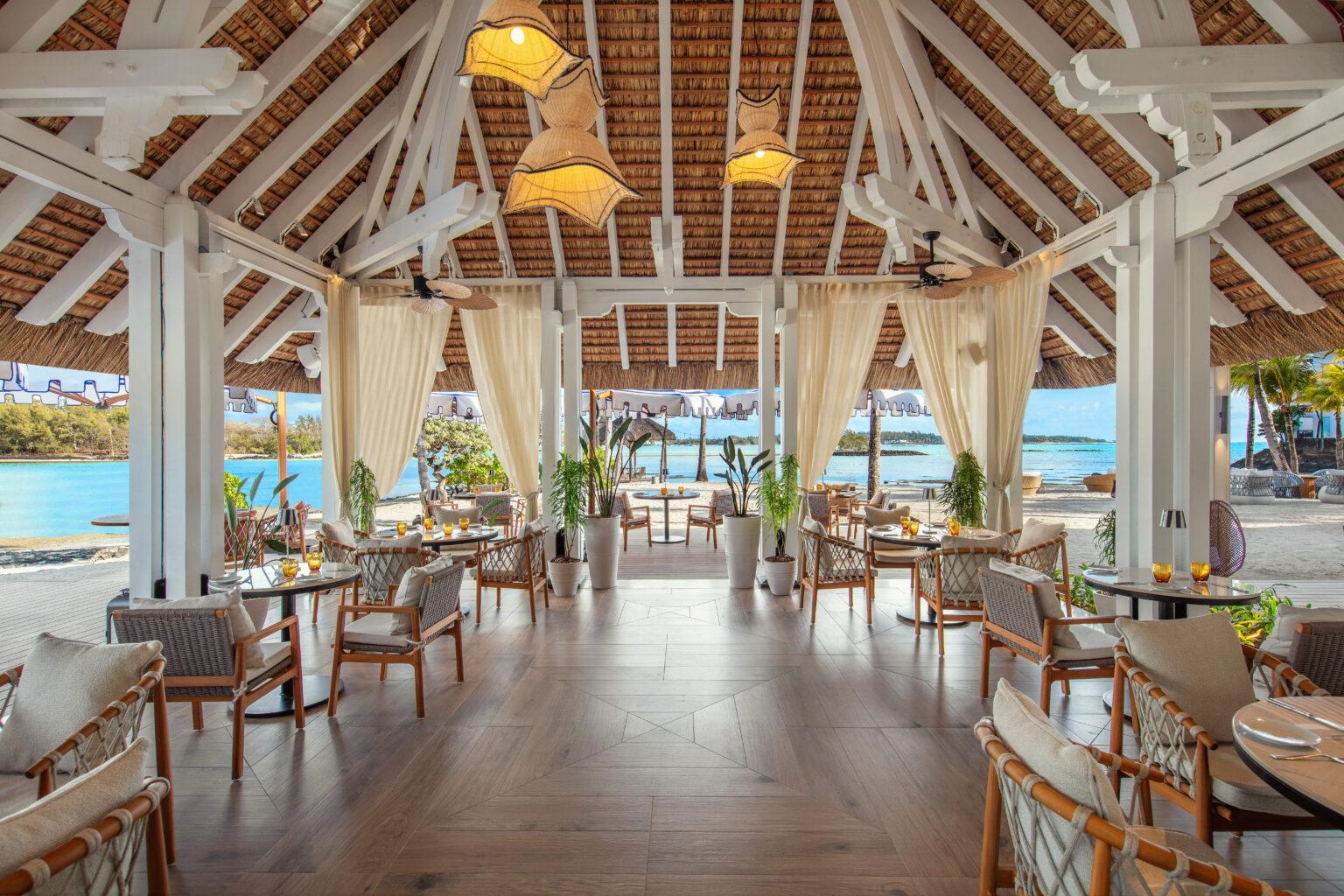 Dining area with panoramic views of the beach at the Shangri-La Le Touessrok Mauritius