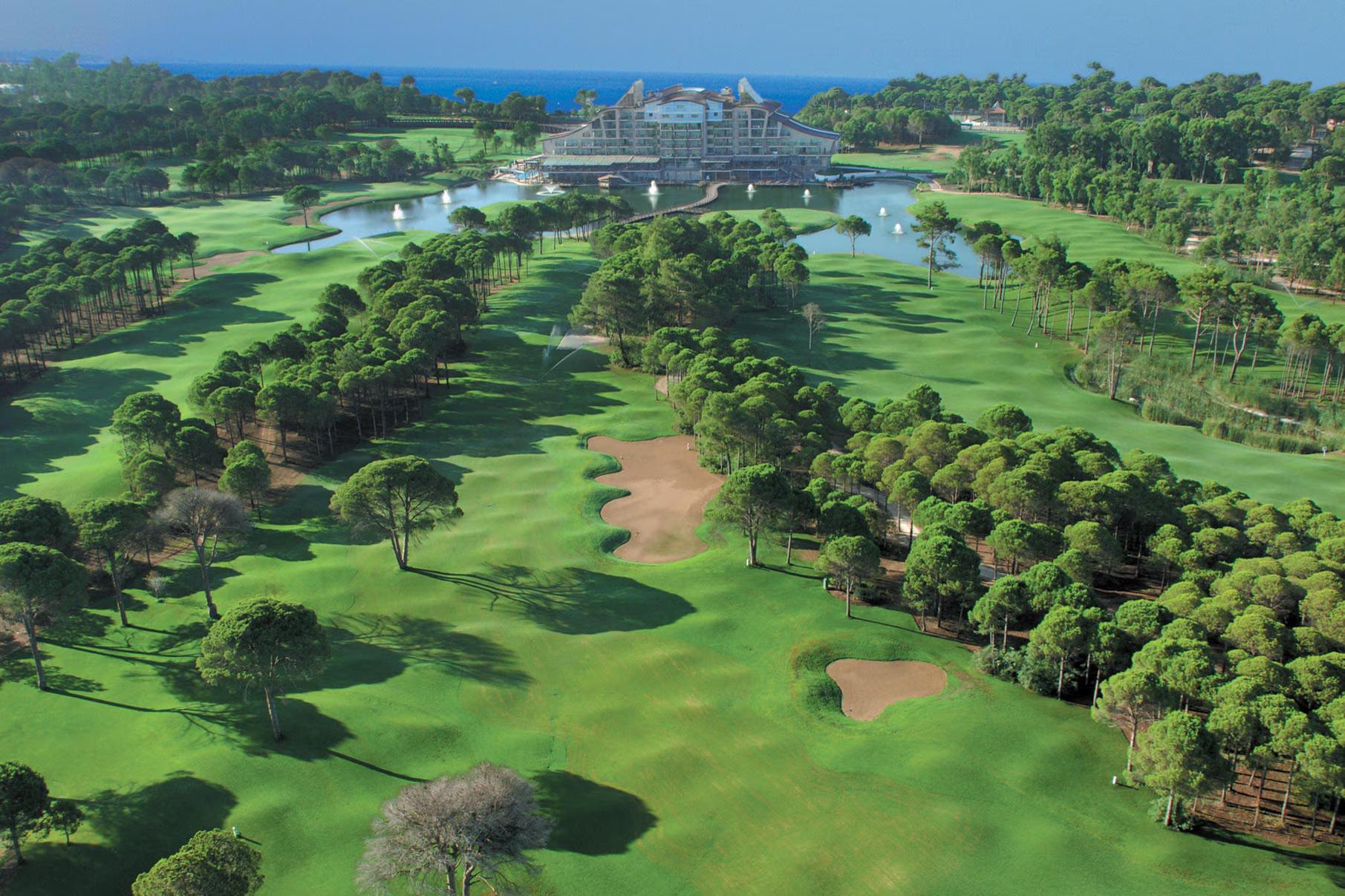 Aerial view of the undulating fairways of Sueno Golf Club with Sueno Hotels Golf in the background