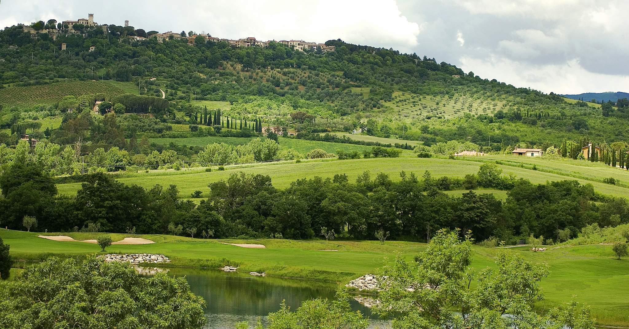 Panoramic view of the Terme di Saturnia Golf Course with their resort at the top of the hill