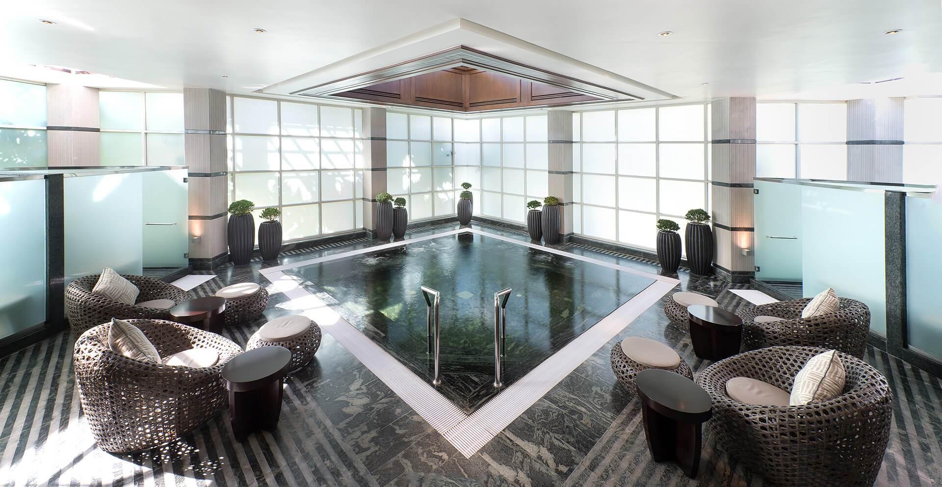 A luxurious indoor swimming pool at the Thai Country Club