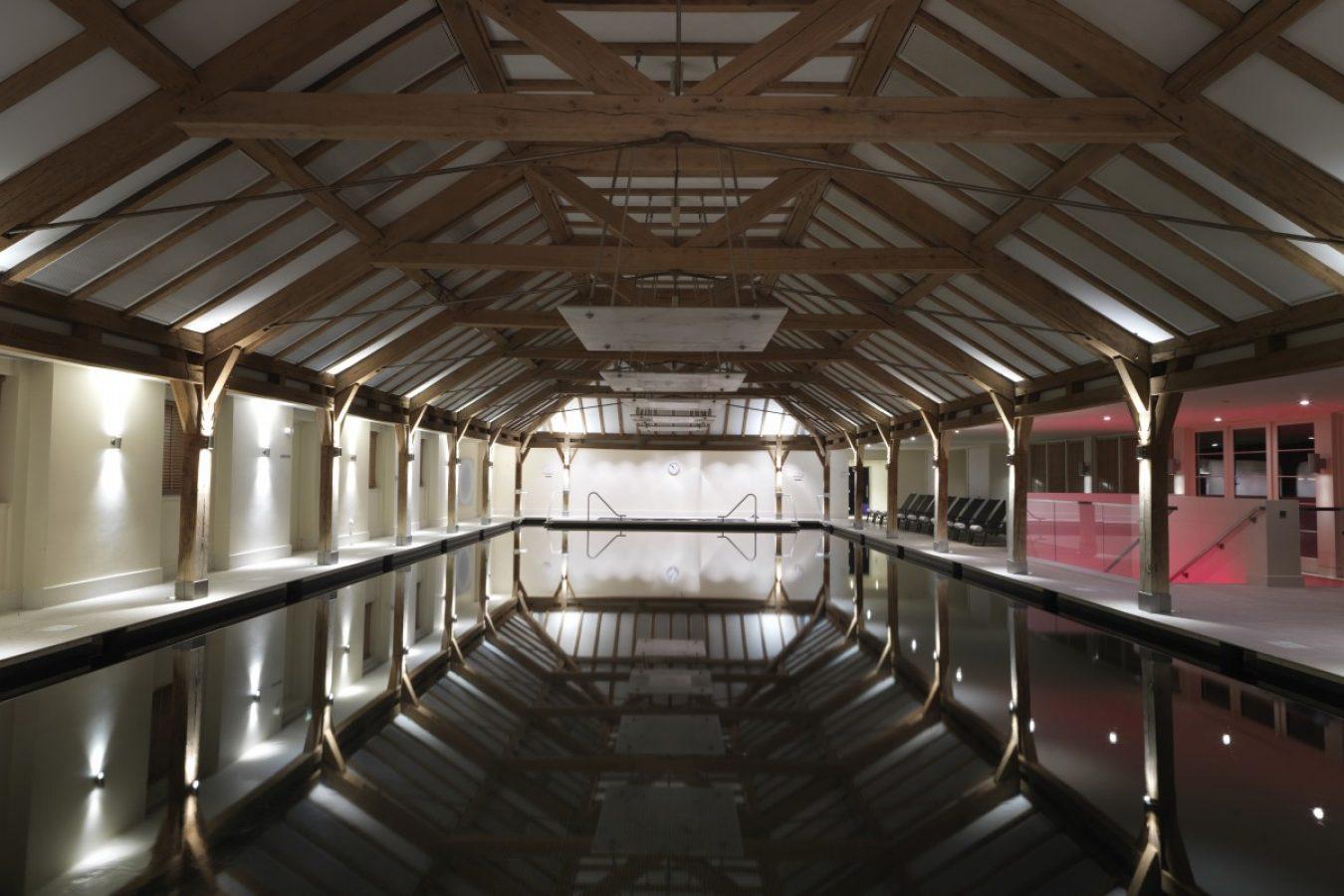 Ceiling reflecting off of the indoor swimming pool