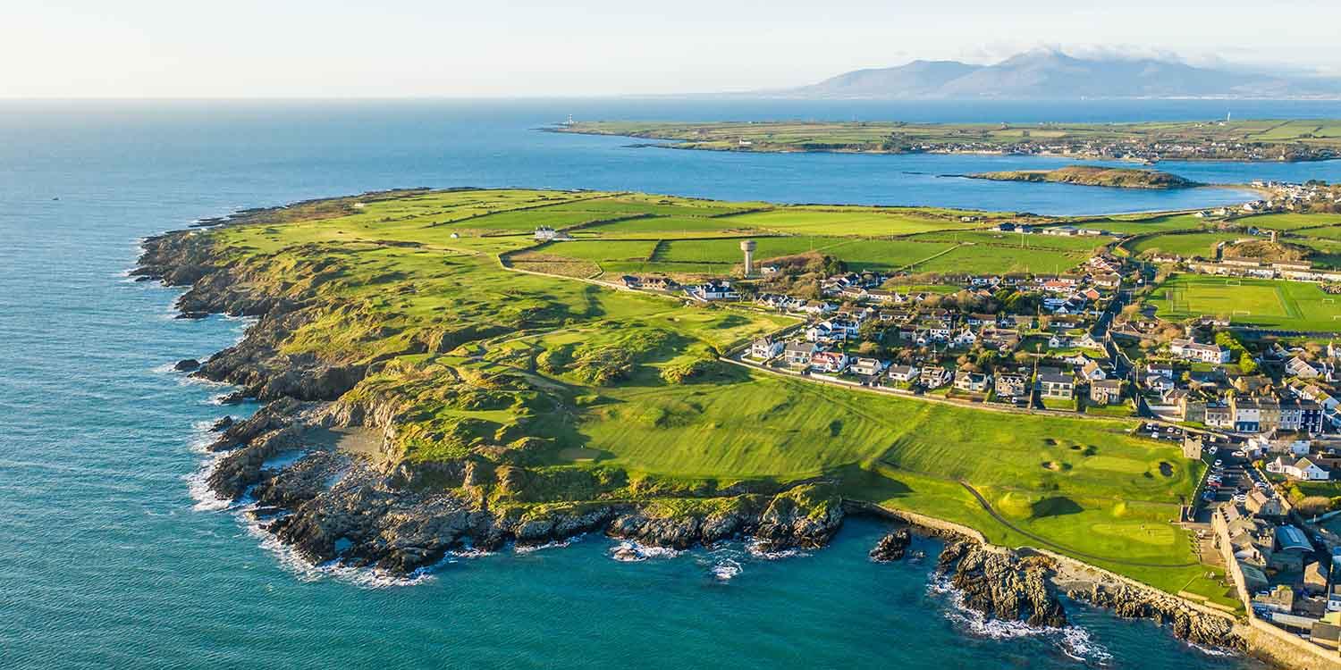 Aerial view of Ardglass course surrounded by rugged coastline
