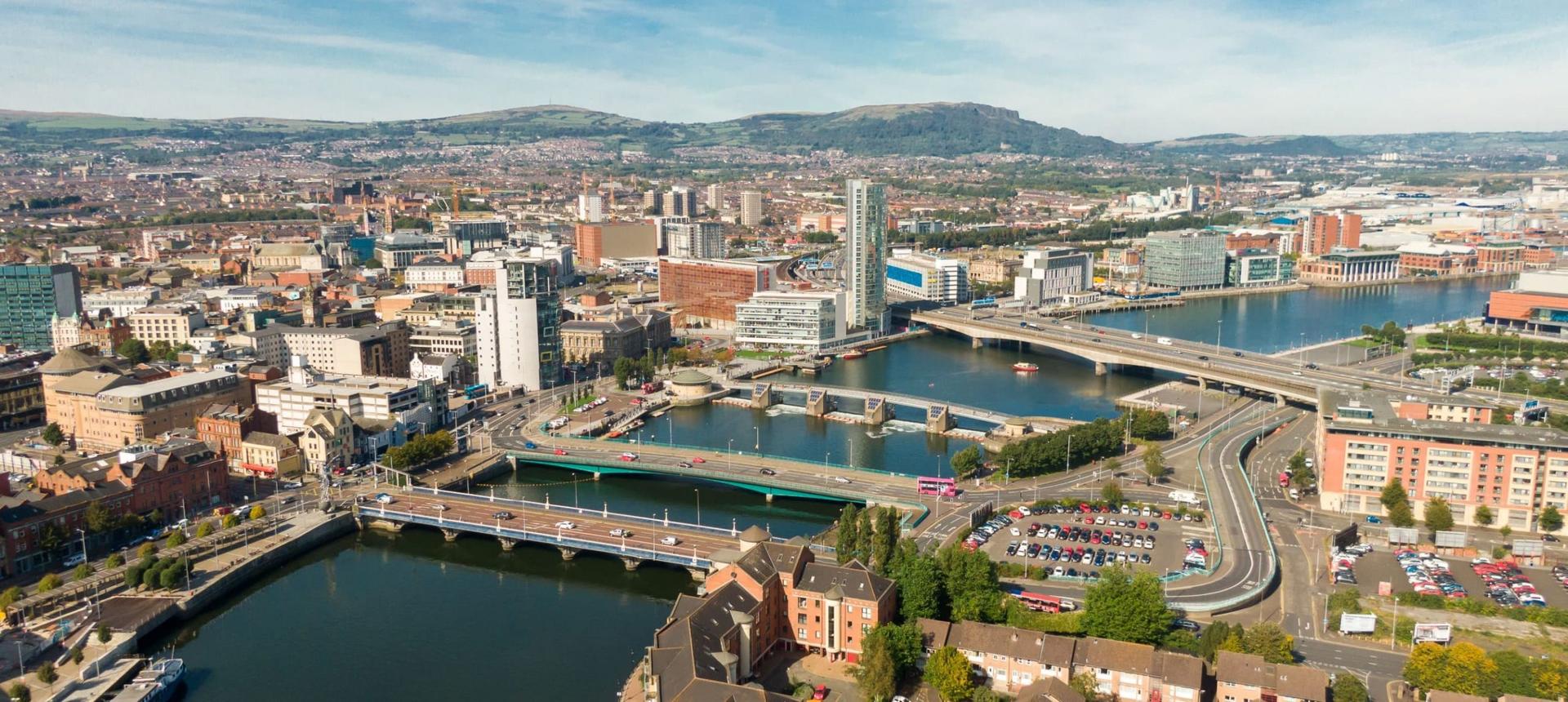 Aerial skyline of Belfast and River Lagan at sunset
