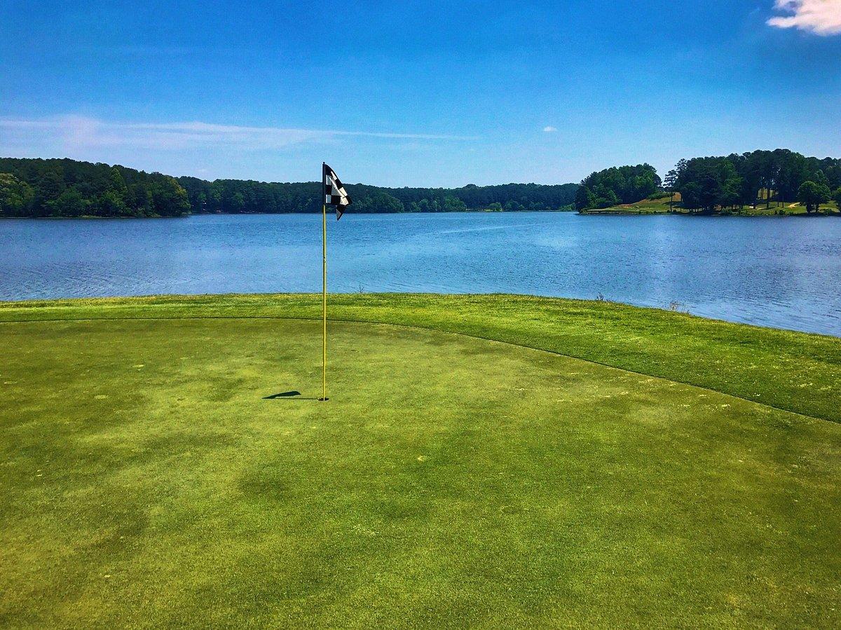 Green at Cobblestone Golf Club with water behind