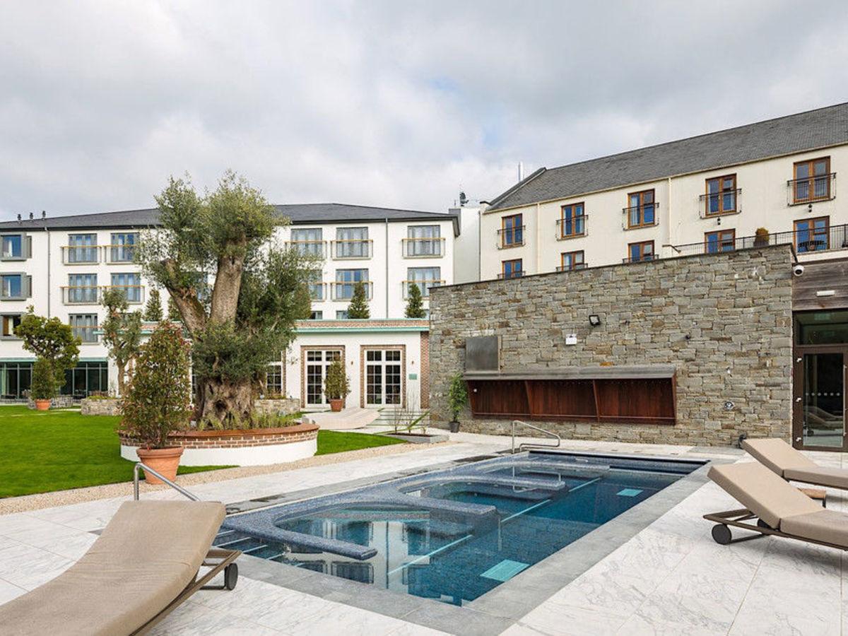 Exterior view of an outdoor swimming pool outside the Galgorm Resort