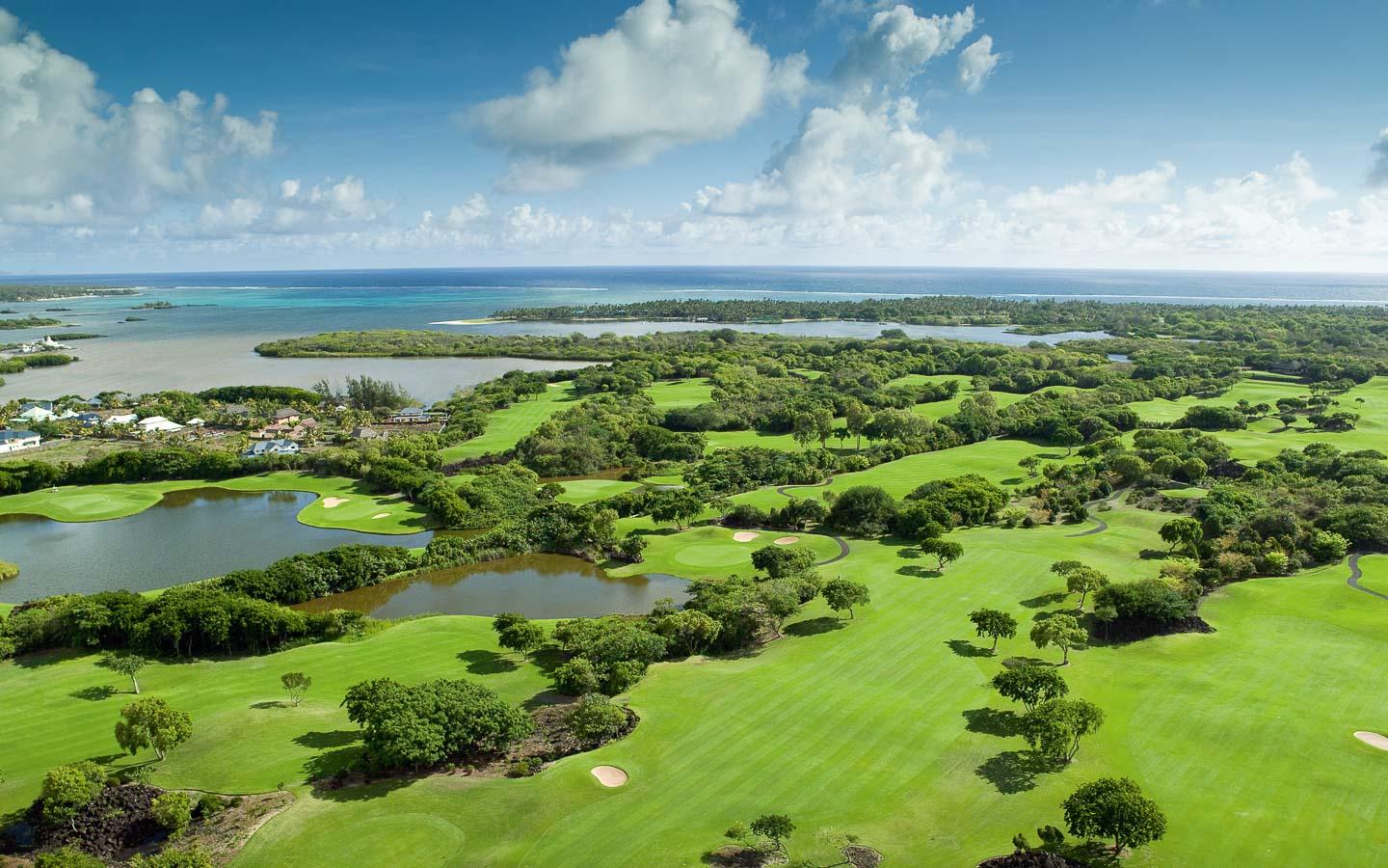 Aerial view of the Links Course with sea views in the background