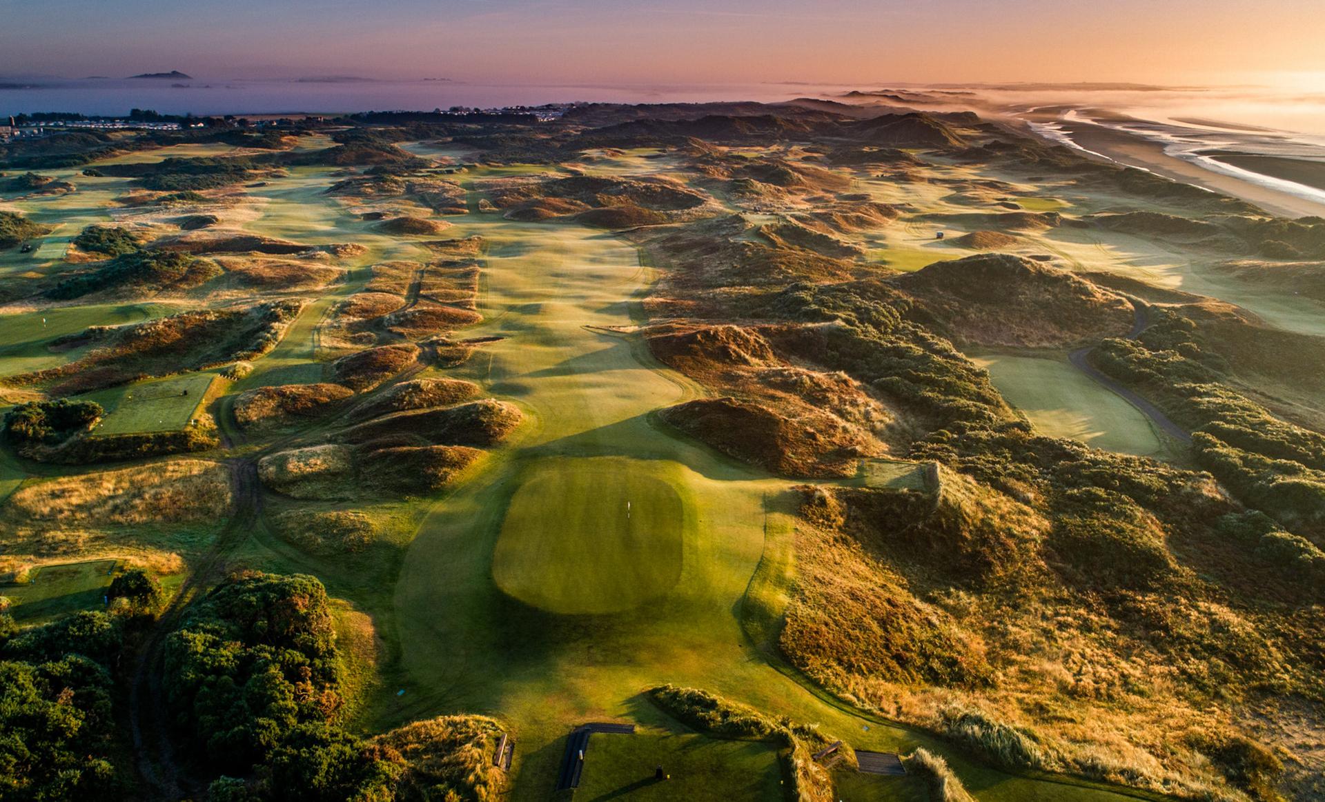 Aerial shot of Royal County Down course at sunset