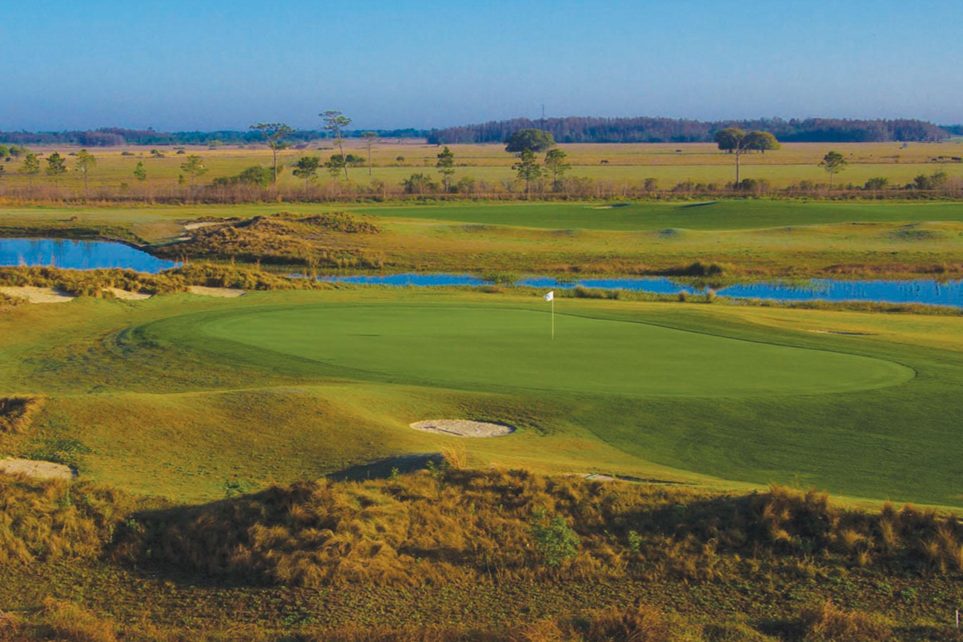 A smooth green under clear blue skies