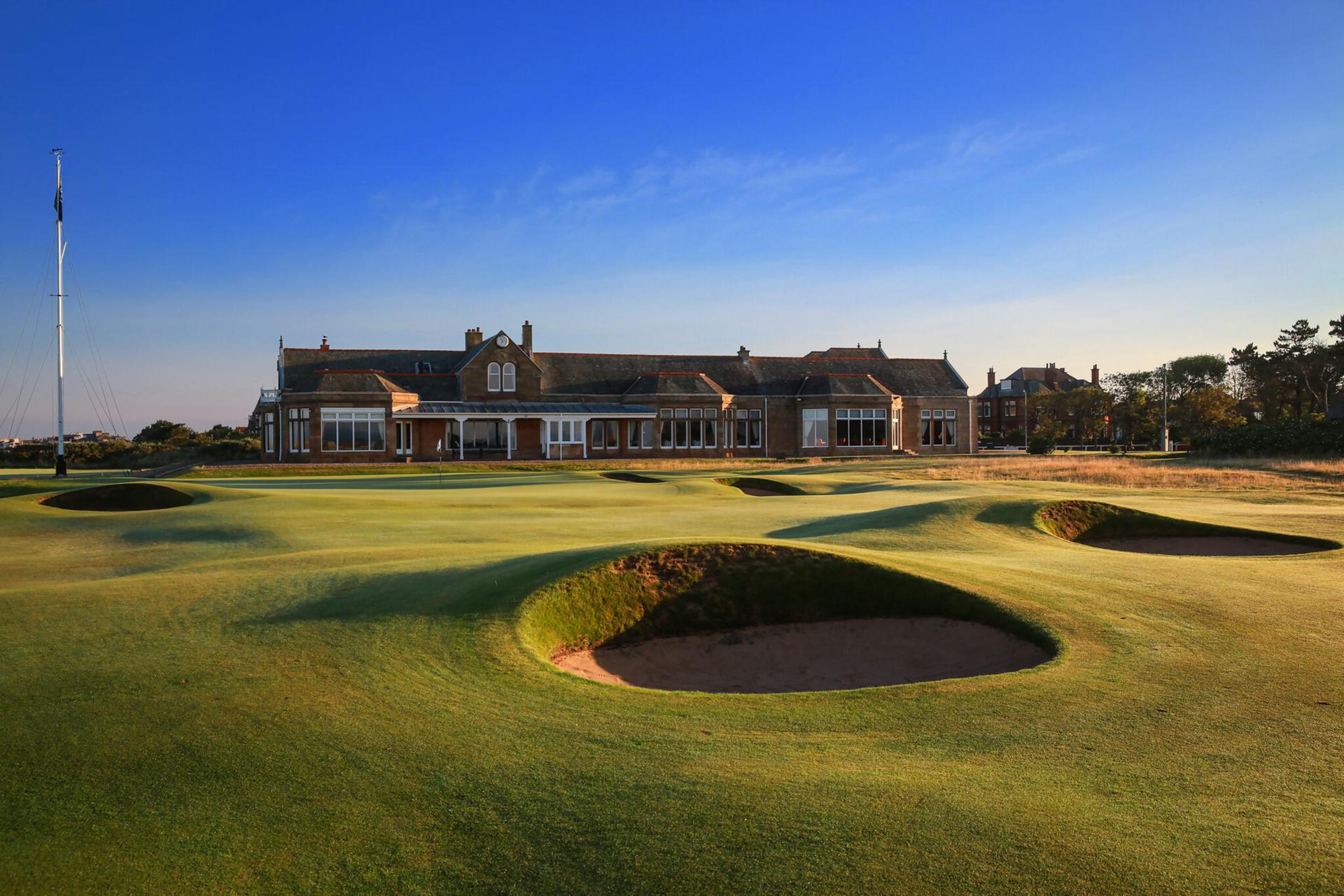 Pot bunkers with the clubhouse behind at Royal Troon
