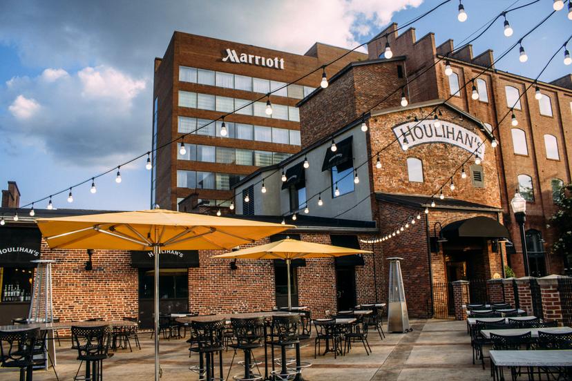 Exterior view of the Marriott hotel next to a bar