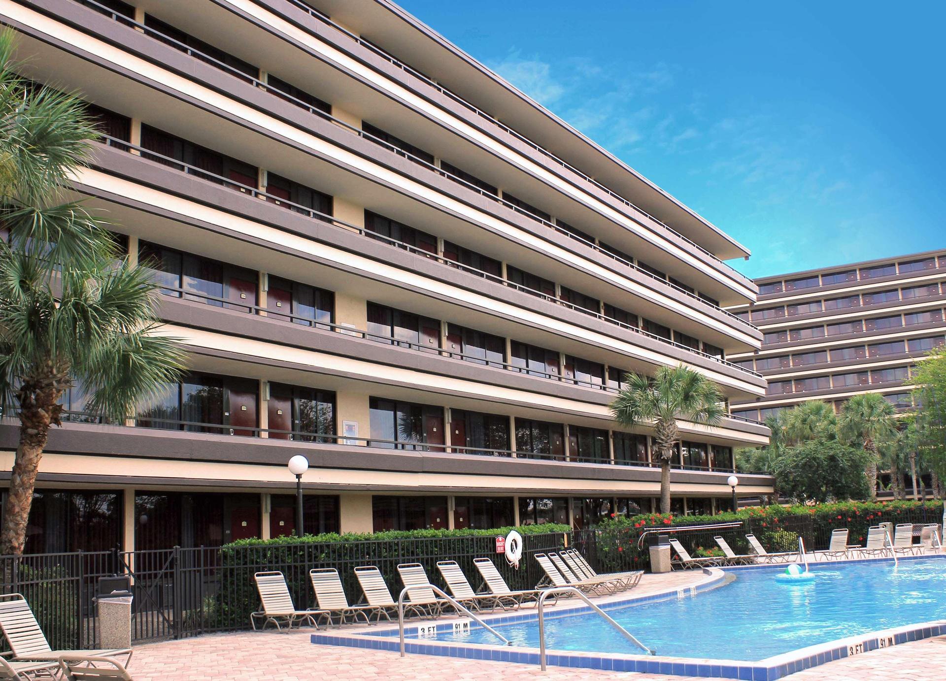Exterior view of the hotel overlooking the outdoor pool