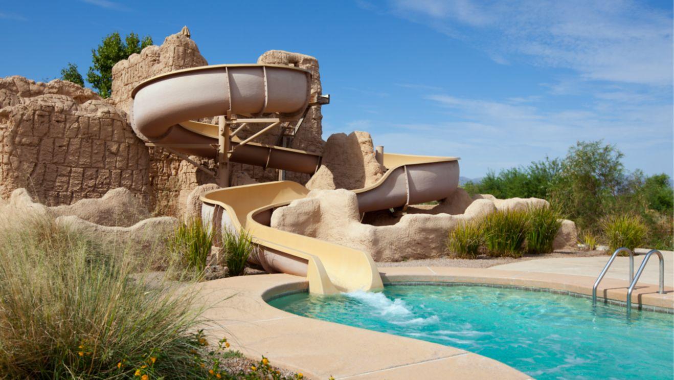 Outdoor swimming pool with a slide