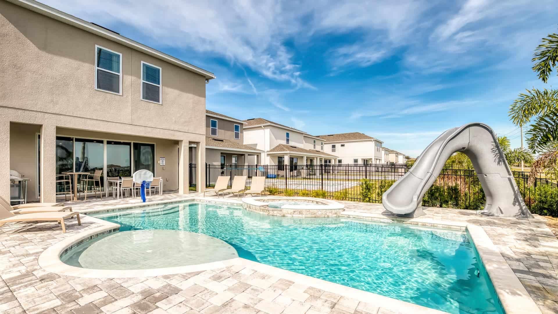 An outdoor swimming pool as part of a resort at the Encore Resort at Reunion