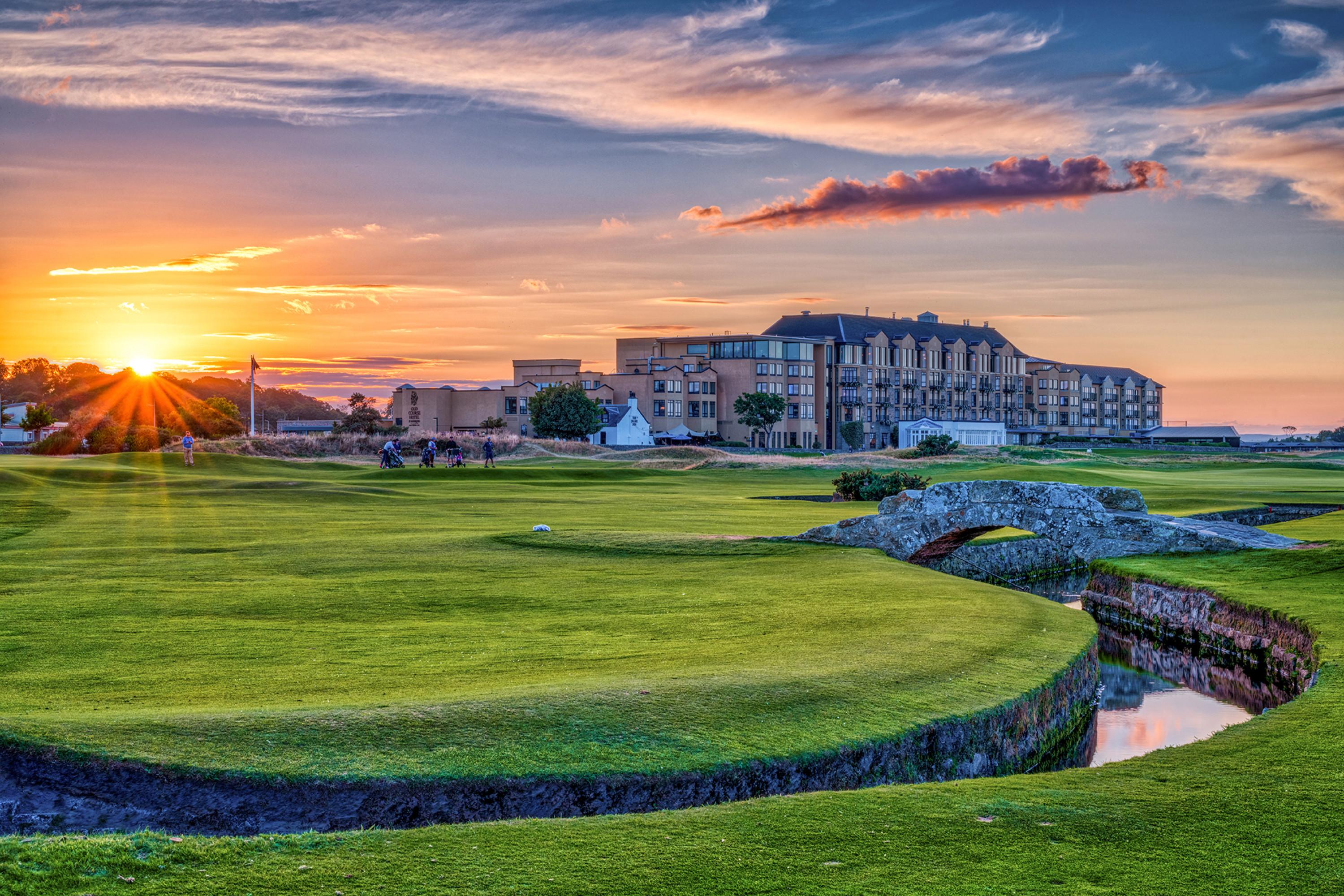 Panoramic view of the old course hotel with the sun shining over the course