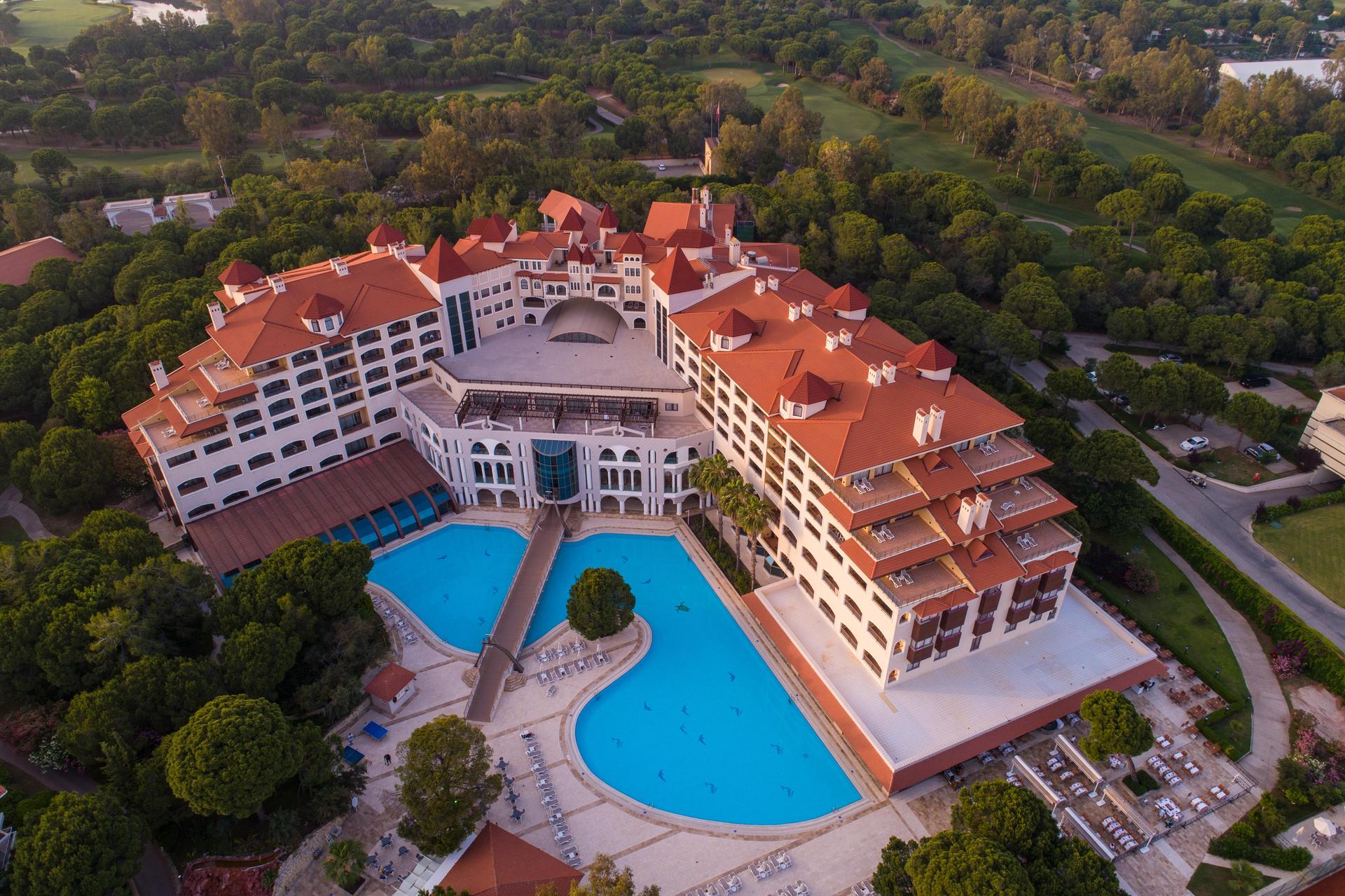 Birdseye view of the Sirene Belek Hotel with an outdoor swimming pool