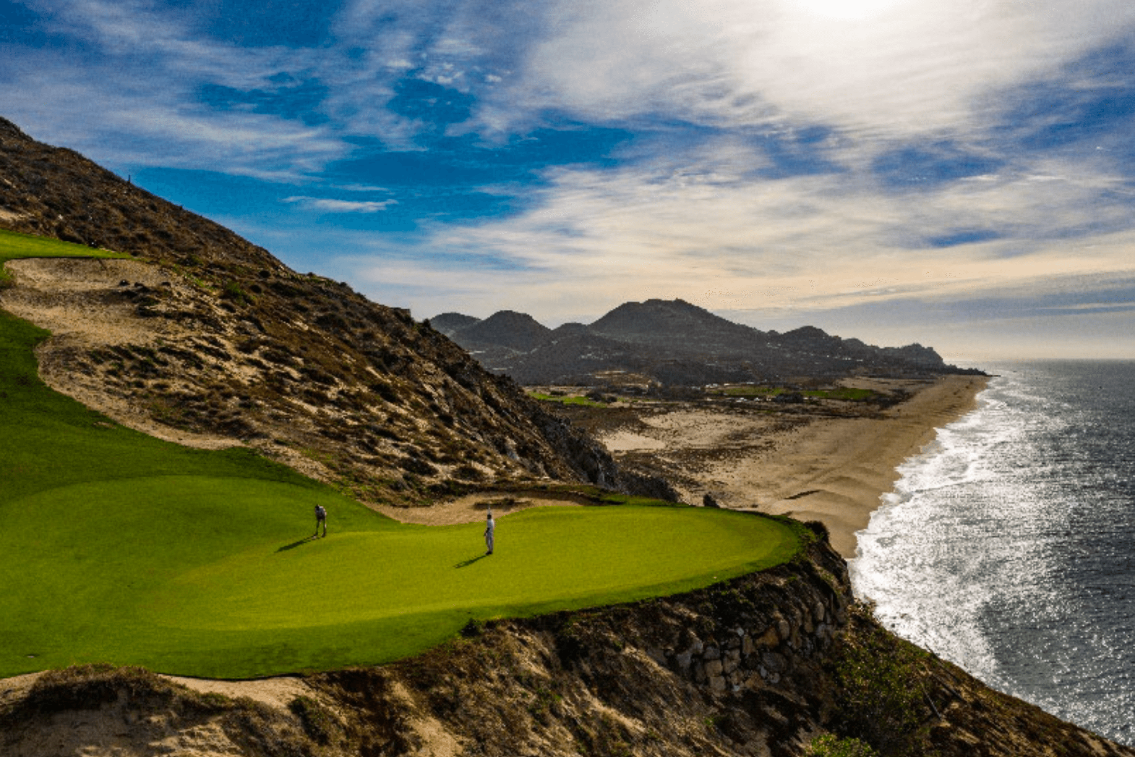 Overhead view of a clifftop coastal green at Pueblo Bonito Pacifica Resort