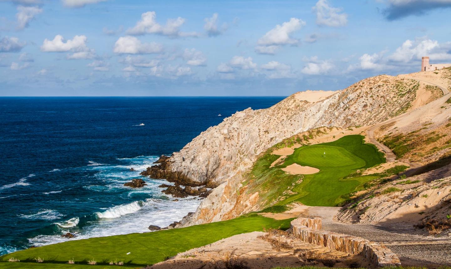 Overhead view of a coastal green with ocean views