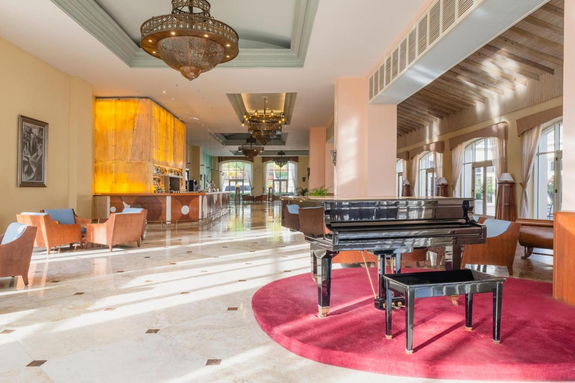 Reception at Iberostar Waves Rose Hall Beach with a grand piano