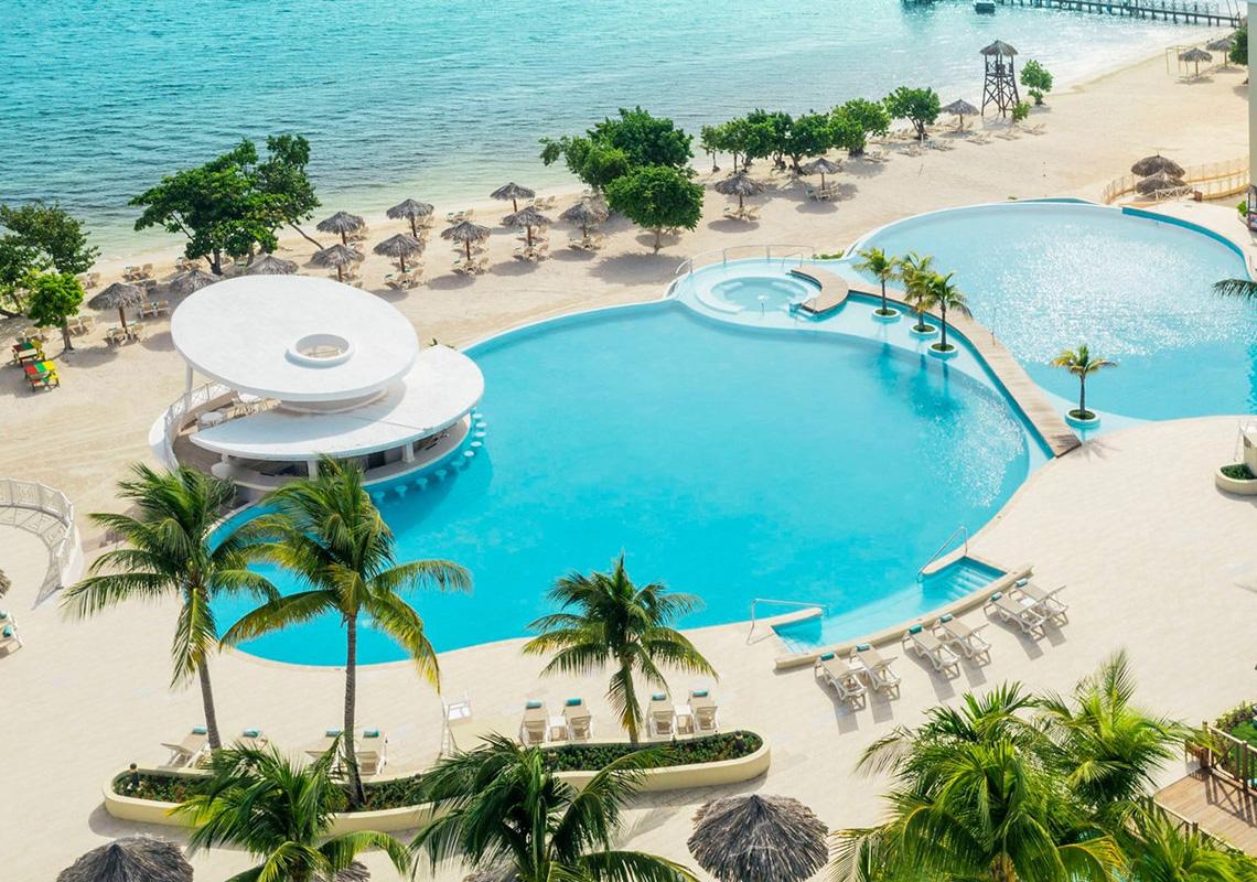 Overhead view of one of the outdoor pools at Iberostar Waves Rose Hall Beach