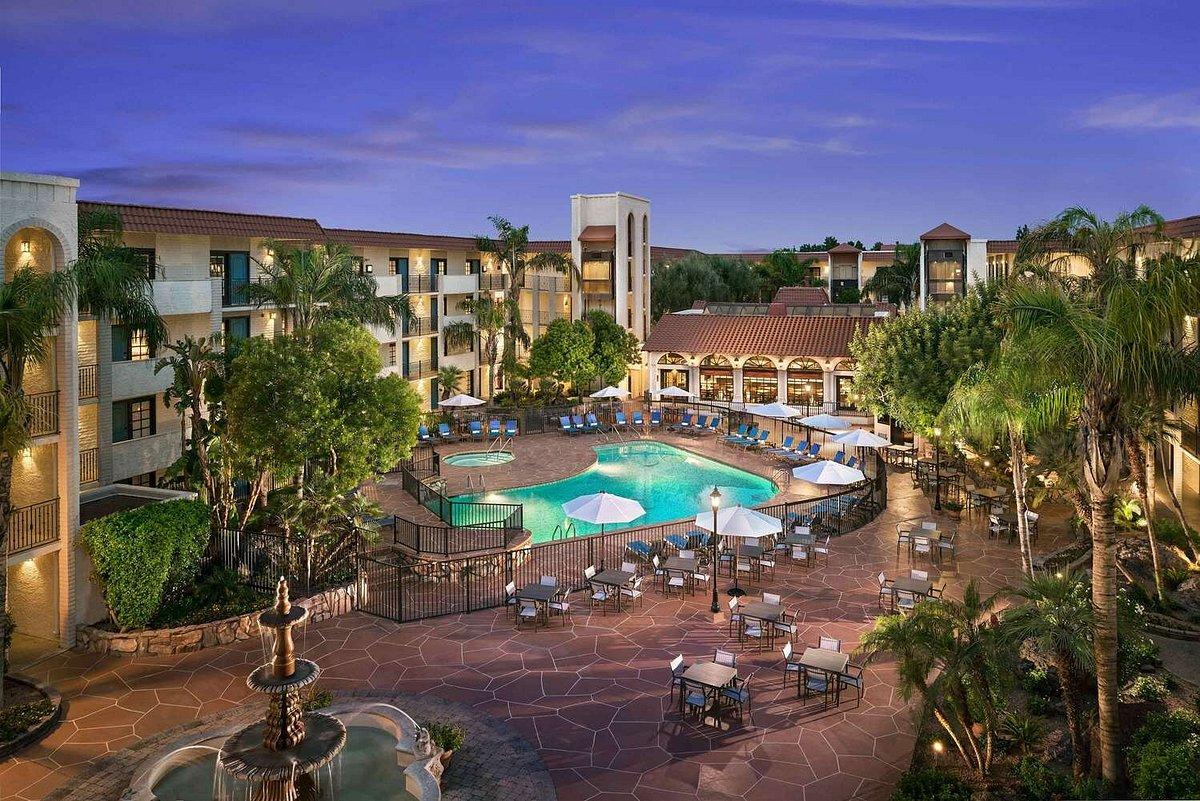 Overhead view of the resorts outdoor swimming pool at evening