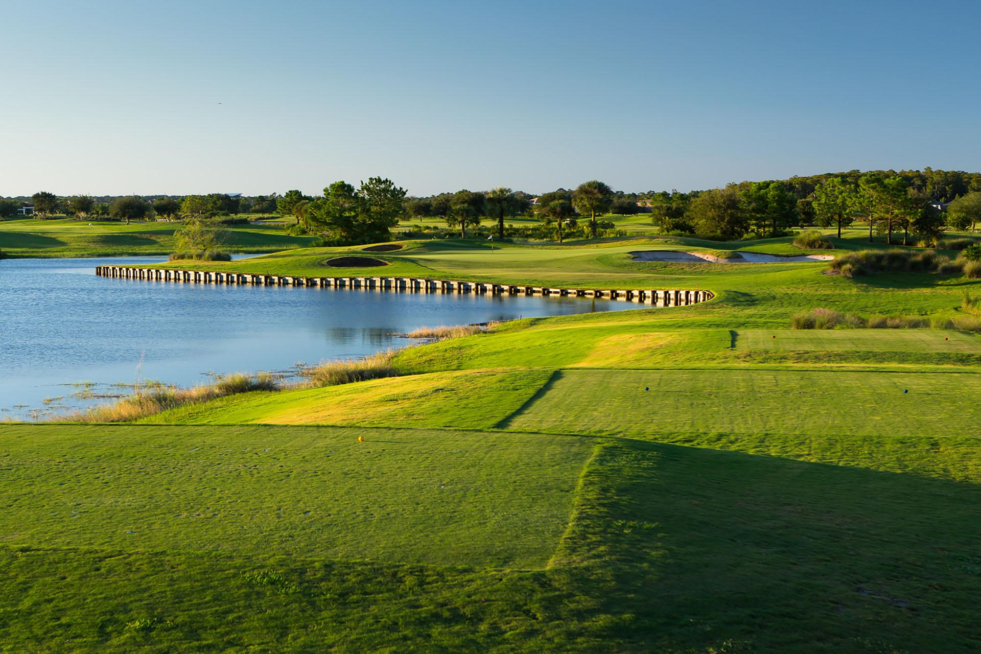 Tee off with the golden sun shining down on the course at the Eagle Creek Golf Club