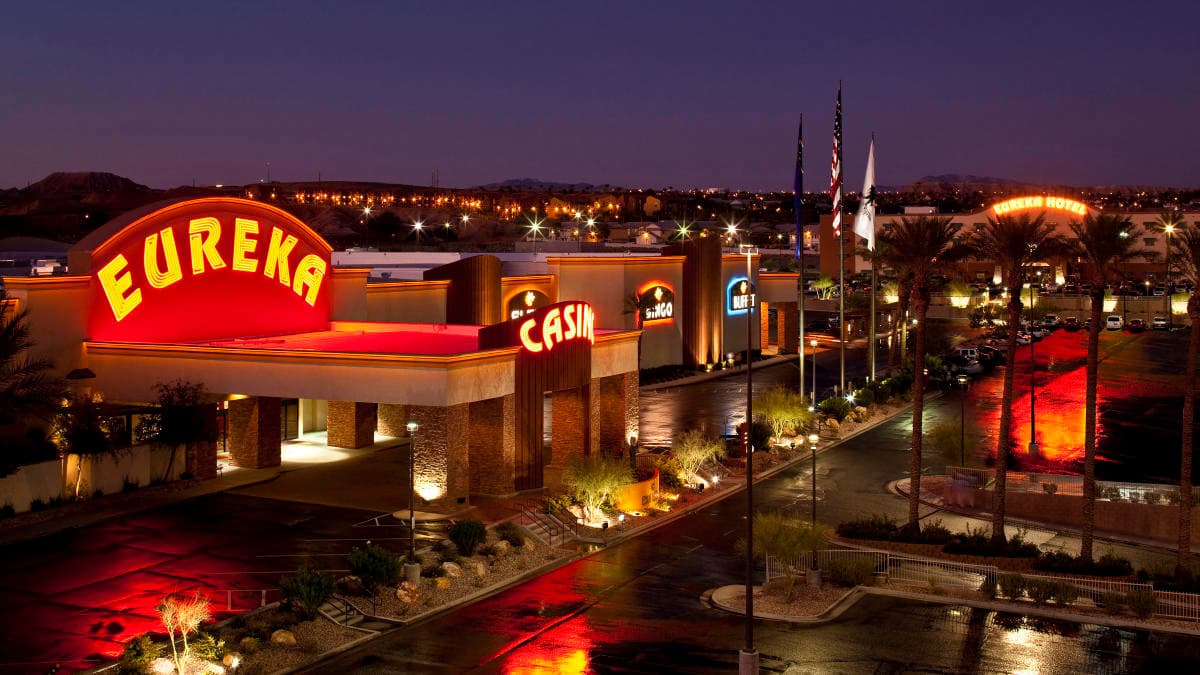 Overhead view of buildings at night being lit up by LED lights