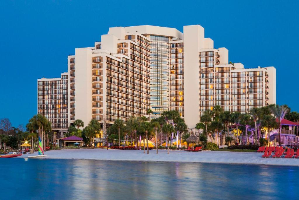 Hyatt Regency hotel building towering over its easily accessible beach as part of the hotel