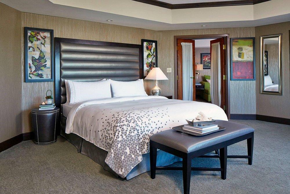 Double bed room at the Renaissance Resort with a doorway that leads to the living room area